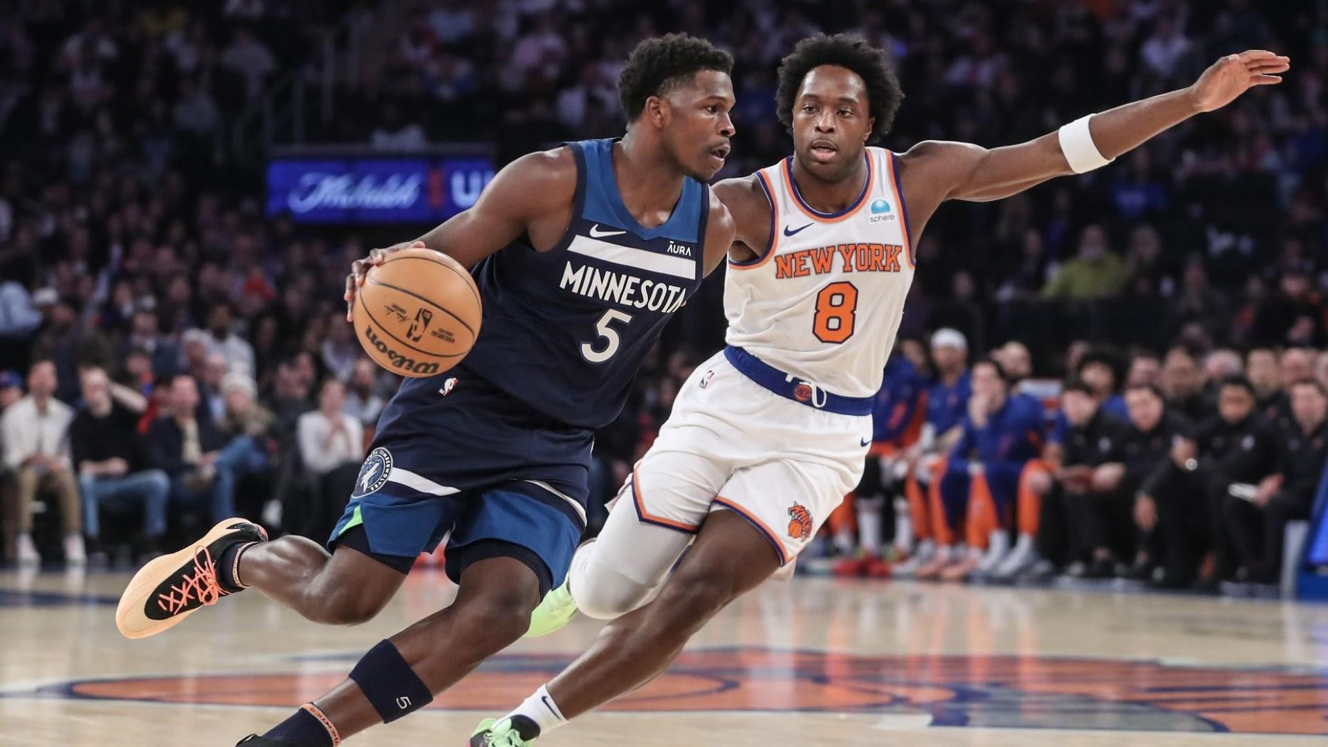 Jan 1, 2024; New York, New York, USA; Minnesota Timberwolves guard Anthony Edwards (5) looks to drive past New York Knicks forward OG Anunoby (8) in the first quarter at Madison Square Garden.