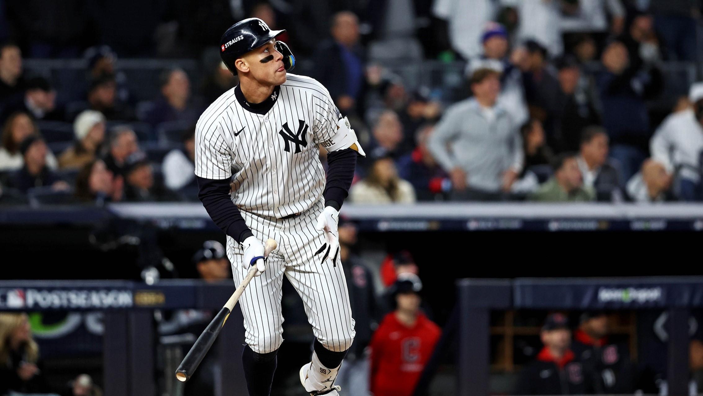 Oct 15, 2024; Bronx, New York, USA; New York Yankees outfielder Aaron Judge (99) hits a two run home run during the seventh inning against the Cleveland Guardians in game two of the ALCS for the 2024 MLB Playoffs at Yankee Stadium.