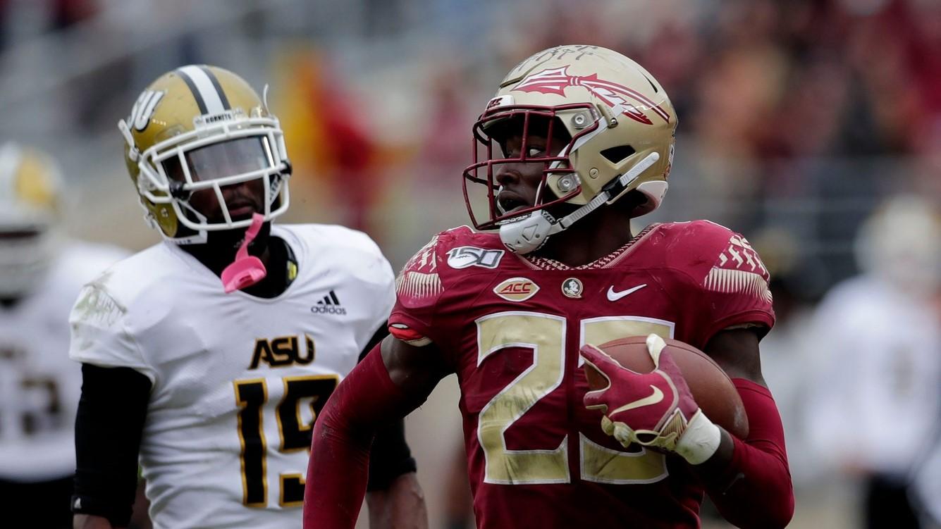 Florida State Seminoles defensive back Hamsah Nasirildeen (23) looks over his shoulder as he scores a touchdown. The Florida State Seminoles beat the Alabama State Hornets 49-12 on Saturday, Nov. 16, 2019.