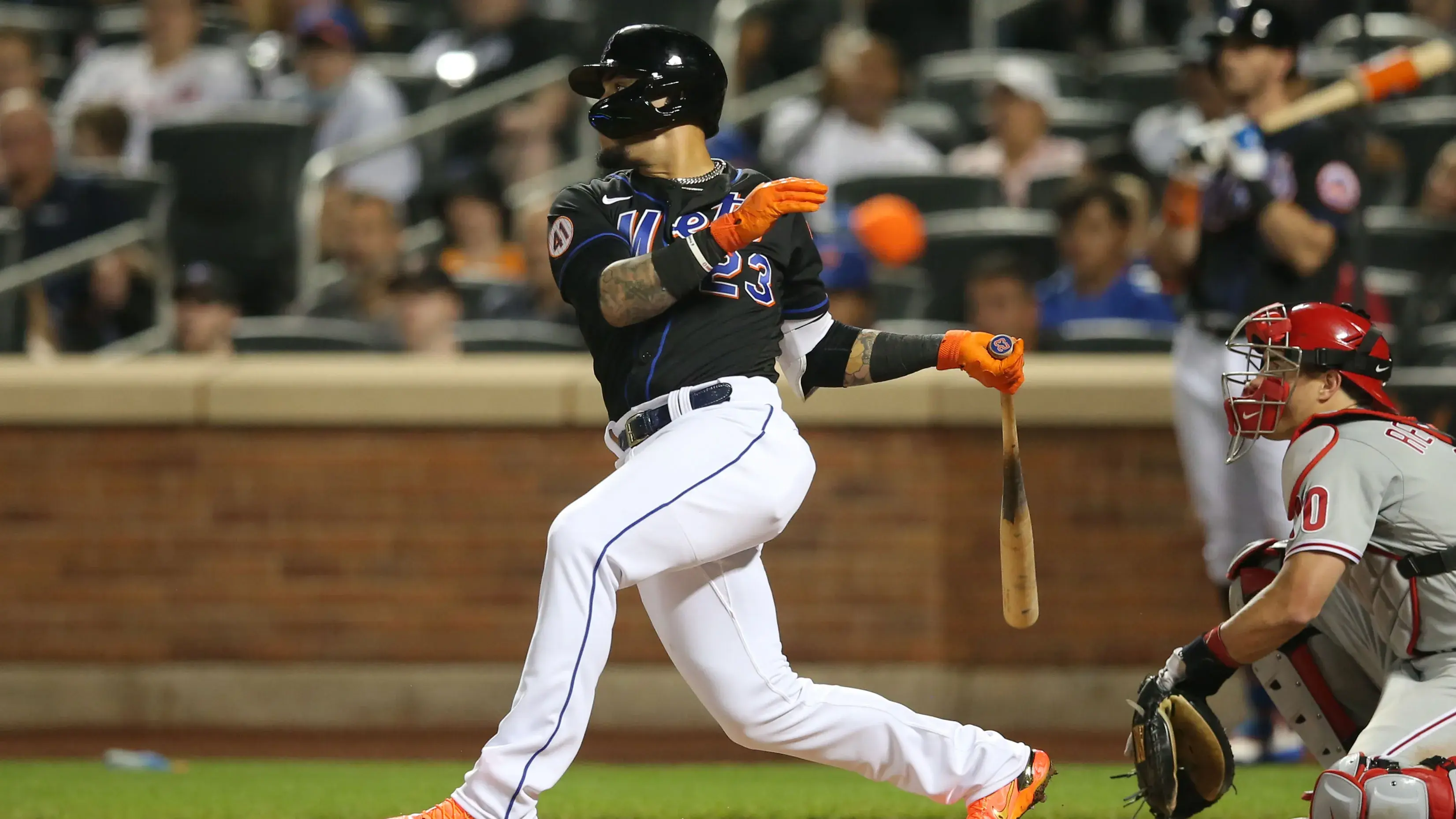 Sep 17, 2021; New York City, New York, USA; New York Mets second baseman Javier Baez (23) follows through on an RBI single against the Philadelphia Phillies during the fourth inning at Citi Field. / Brad Penner-USA TODAY Sports