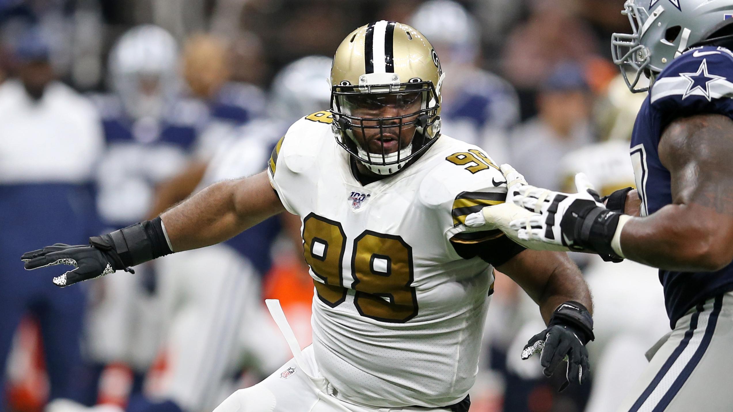 Sep 29, 2019; New Orleans, LA, USA; New Orleans Saints defensive tackle Sheldon Rankins (98) is blocked by Dallas Cowboys offensive tackle Tyron Smith (77) in the second half at the Mercedes-Benz Superdome.