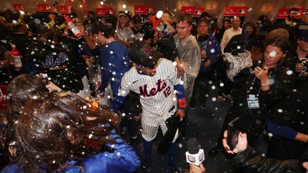 Oct 9, 2024; New York, New York, USA; New York Mets shortstop Francisco Lindor (12) celebrates in the clubhouse after defeating the Philadelphia Phillies in game four of the NLDS for the 2024 MLB Playoffs at Citi Field.