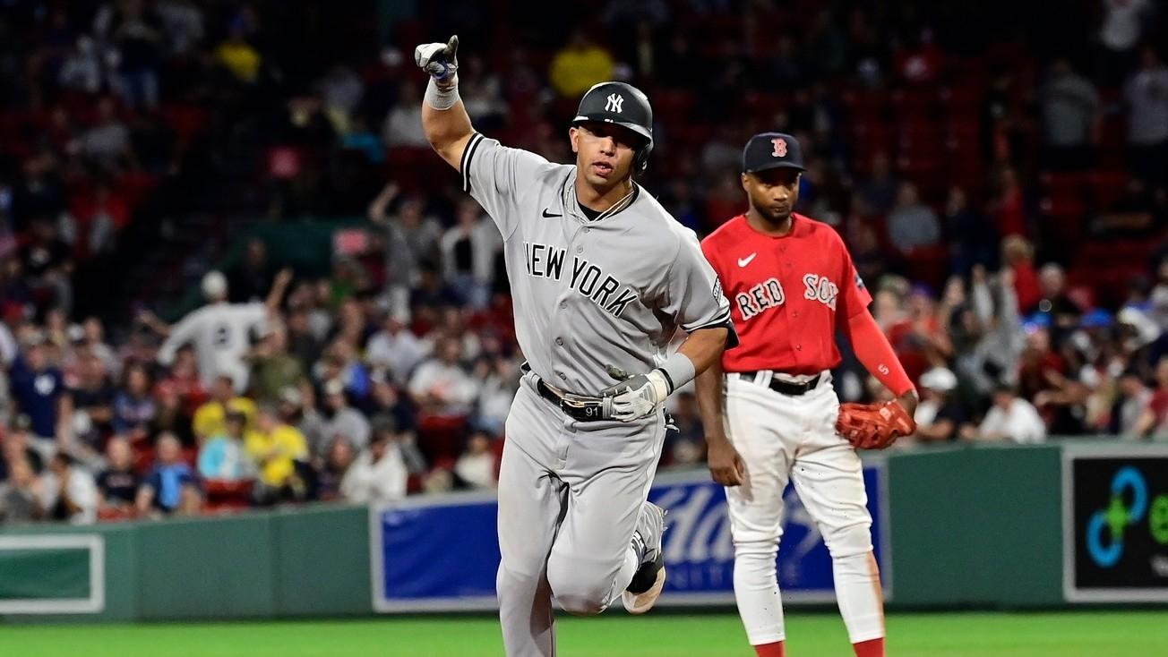 New York Yankees third baseman Oswald Peraza (91) reacts to his two run home run against the Boston Red Sox during the ninth inning at Fenway Park.