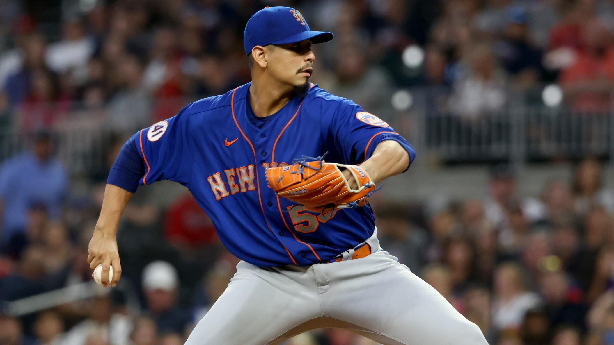 Oct 2, 2021; Atlanta, Georgia, USA; New York Mets starting pitcher Carlos Carrasco (59) throws against the Atlanta Braves during the first inning at Truist Park.