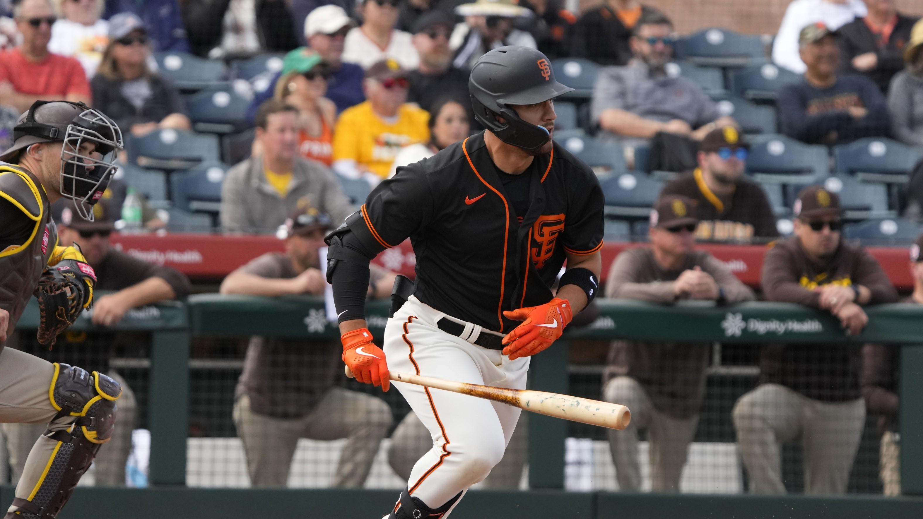 Feb 28, 2023; Scottsdale, Arizona, USA; San Francisco Giants right fielder Michael Conforto (8) hits an RBI grounder against the San Diego Padres in the third