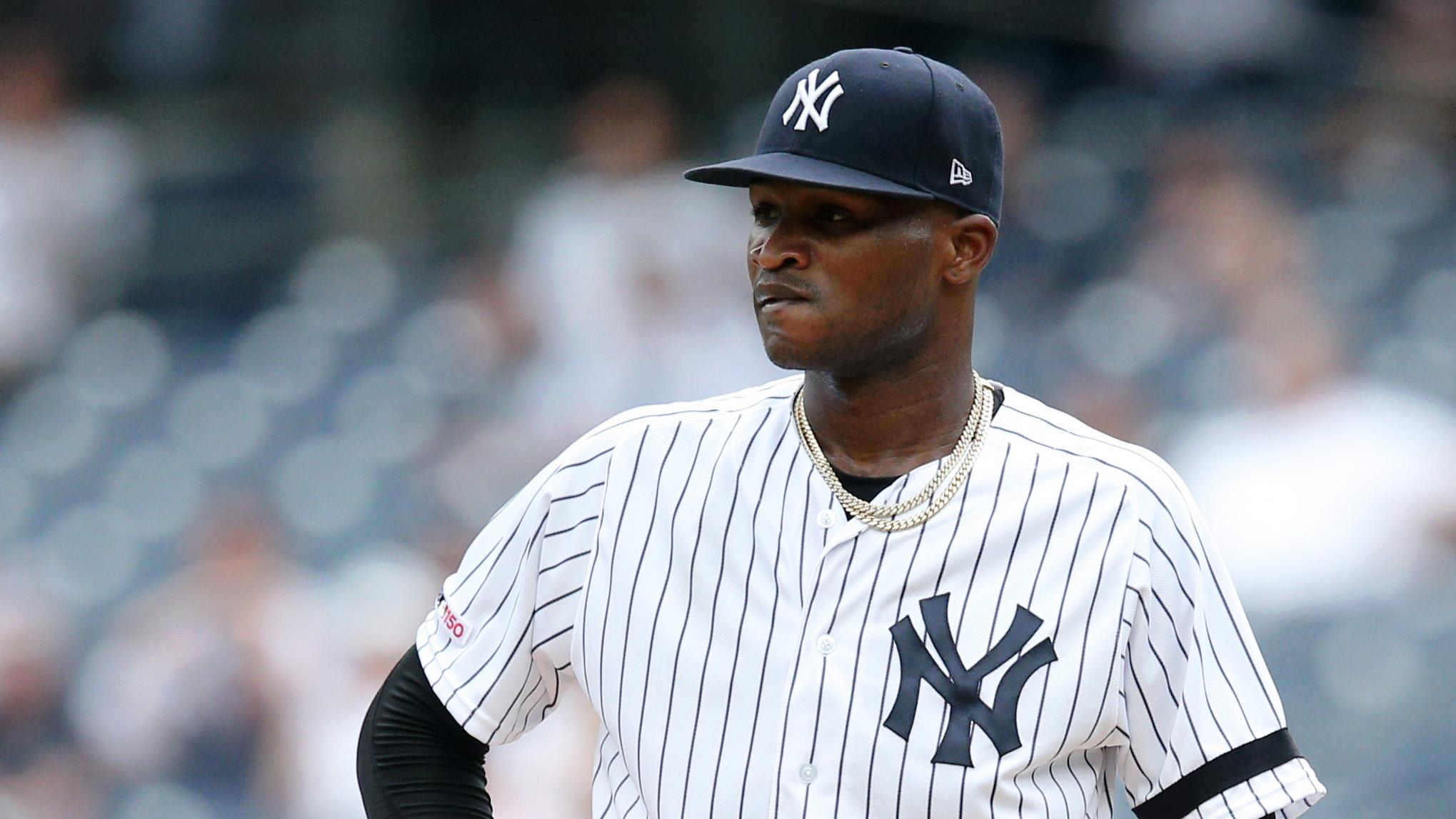 Domingo German stands stoic on the mound