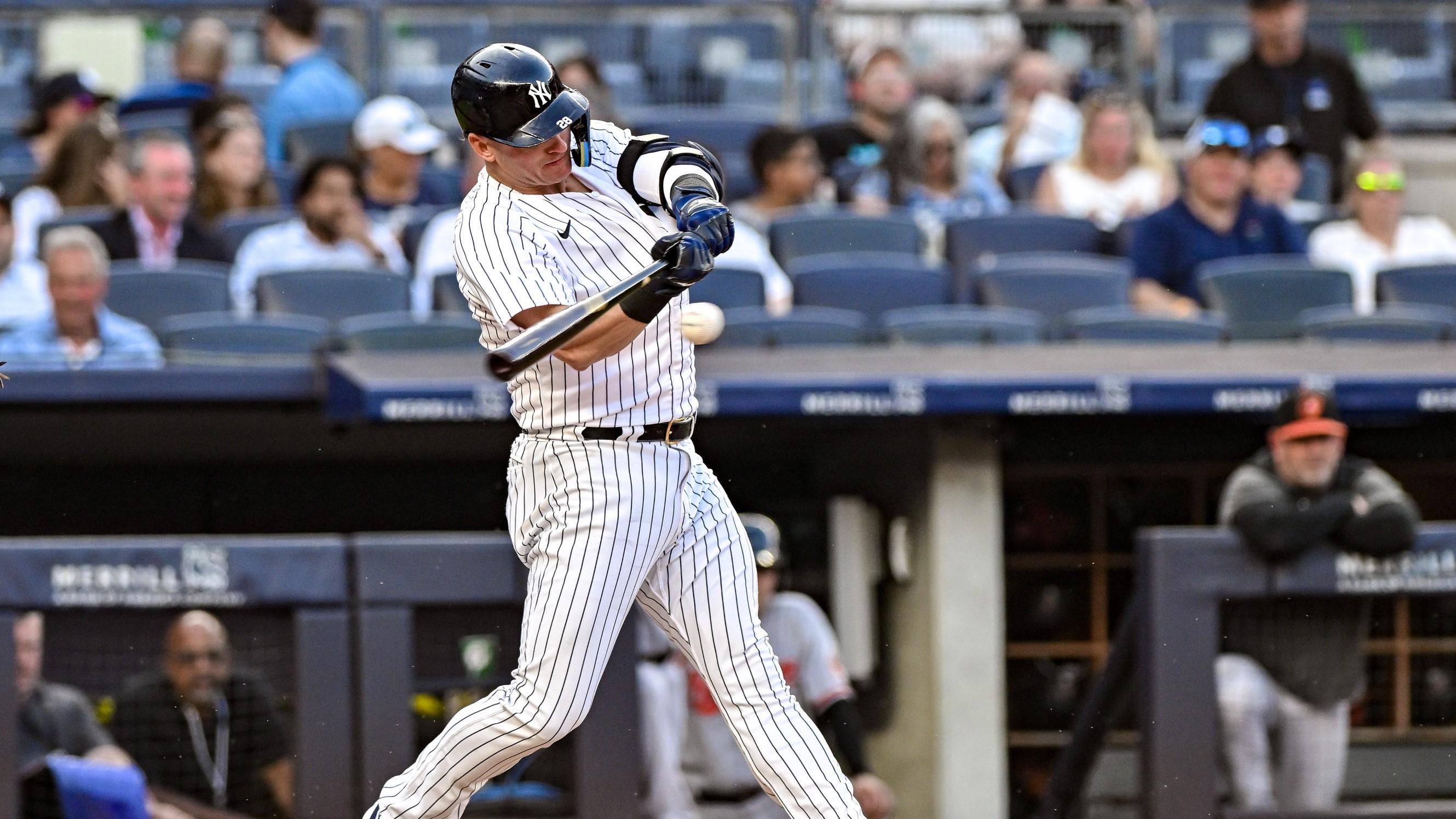 Jul 5, 2023; Bronx, New York, USA; New York Yankees third baseman Josh Donaldson (28) hits a single against the Baltimore Orioles during the second inning at Yankee Stadium.