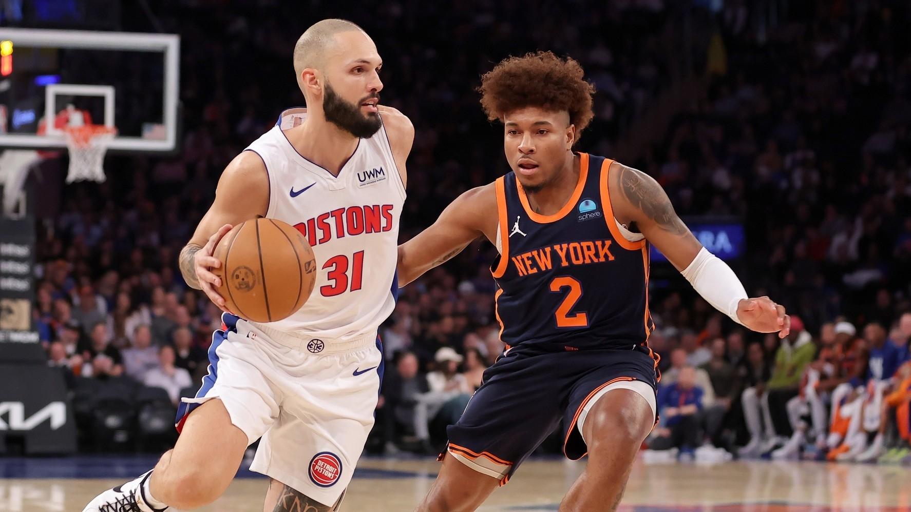 Detroit Pistons guard Evan Fournier (31) controls the ball against New York Knicks guard Miles McBride (2) during the second quarter at Madison Square Garden.