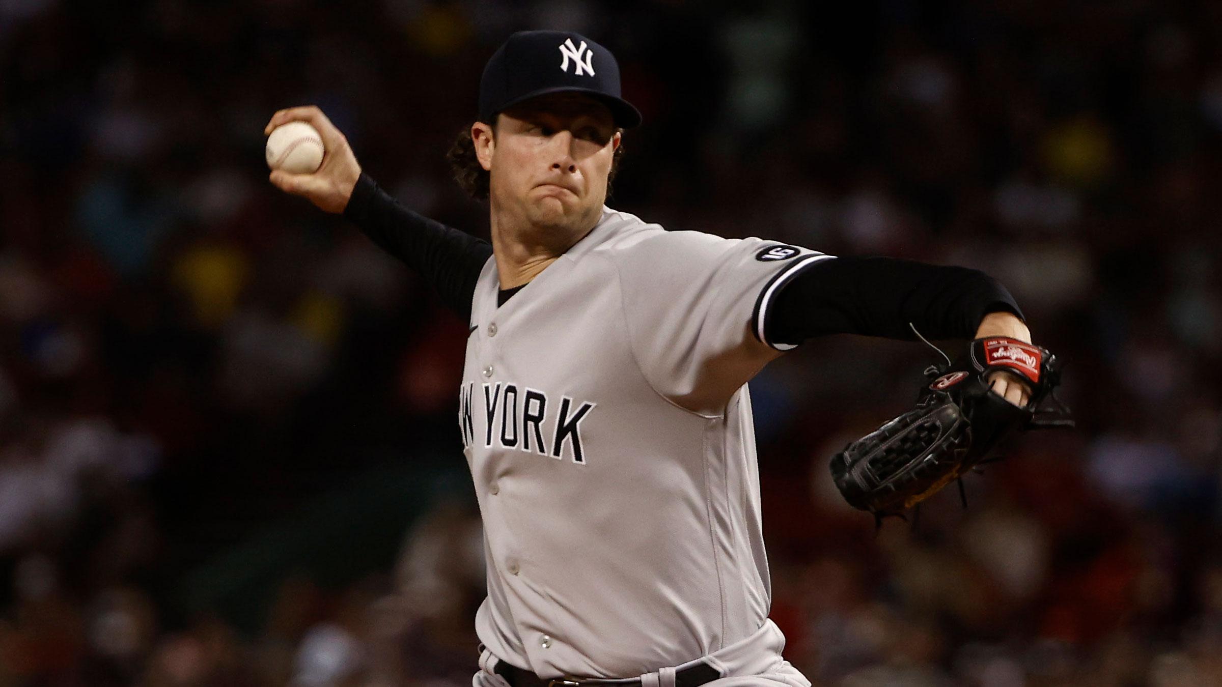 Sep 24, 2021; Boston, Massachusetts, USA; New York Yankees starting pitcher Gerrit Cole (45) delivers against the Boston Red Sox during the first inning at Fenway Park.