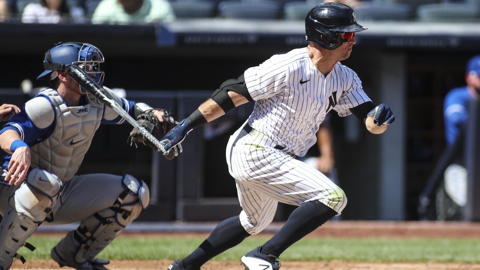 Sep 6, 2021; Bronx, New York, USA; New York Yankees center fielder Brett Gardner (11) hits a single in the third inning against the Toronto Blue Jays at Yankee Stadium. / Wendell Cruz-USA TODAY Sports