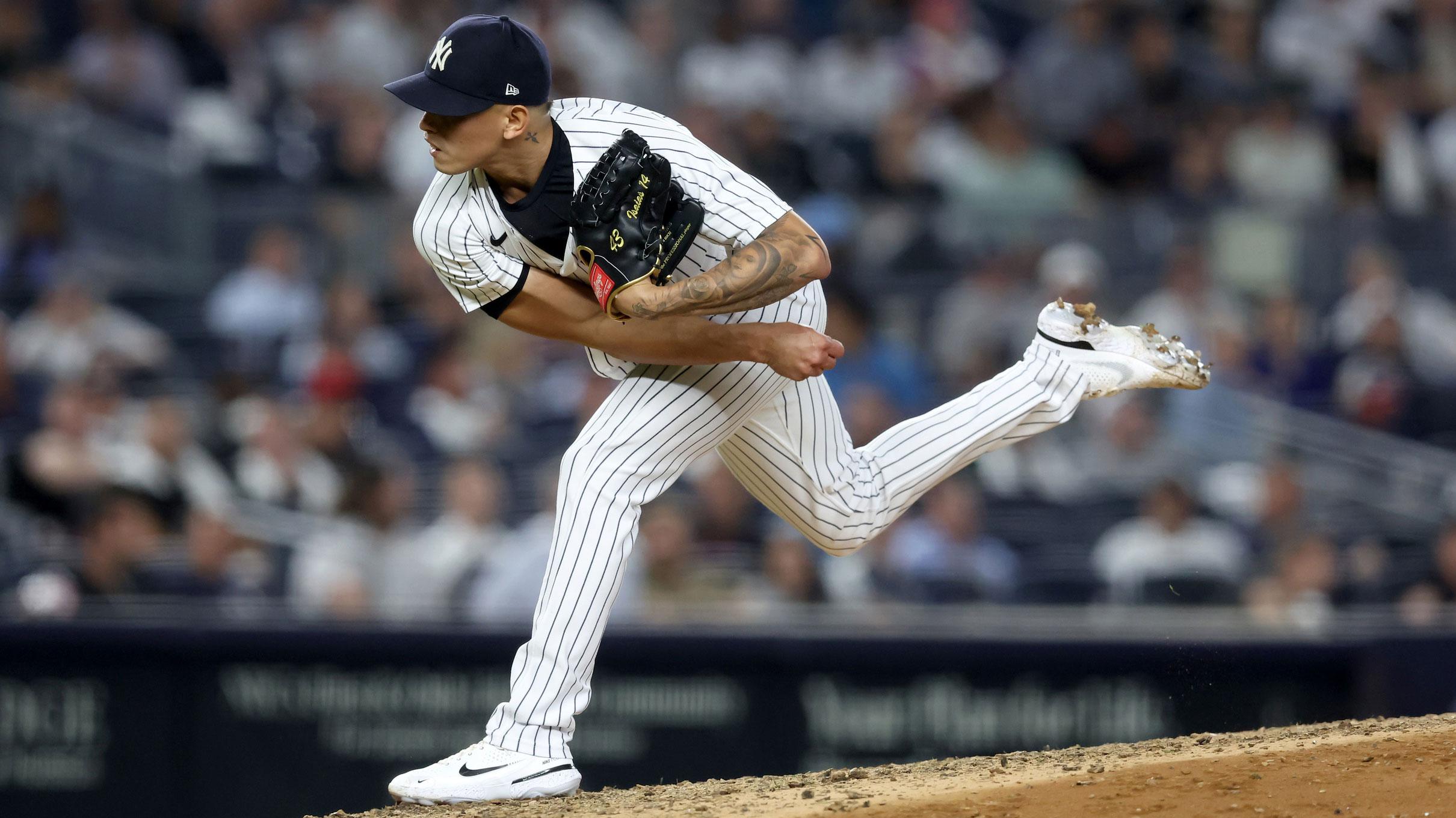 Sep 20, 2022; Bronx, New York, USA; New York Yankees relief pitcher Jonathan Loaisiga (43) follows through on a pitch against the Pittsburgh Pirates during the eighth inning at Yankee Stadium.