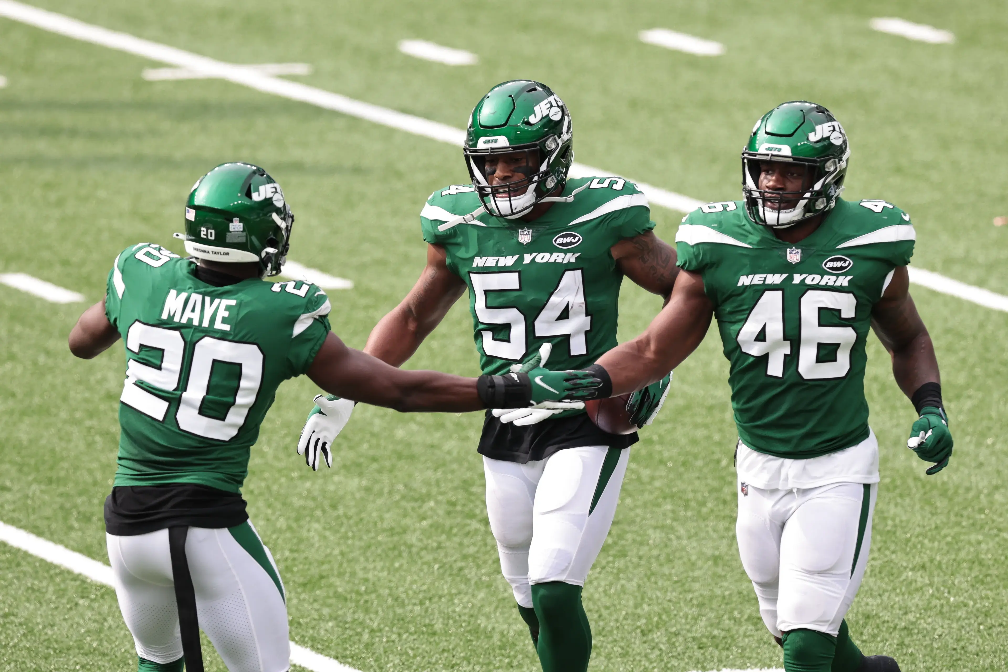 Oct 11, 2020; East Rutherford, New Jersey, USA; New York Jets inside linebacker Avery Williamson (54) celebrates his interception with free safety Marcus Maye (20) against the Arizona Cardinals during the first half at MetLife Stadium. Mandatory Credit: Vincent Carchietta-USA TODAY Sports / © Vincent Carchietta-USA TODAY Sports