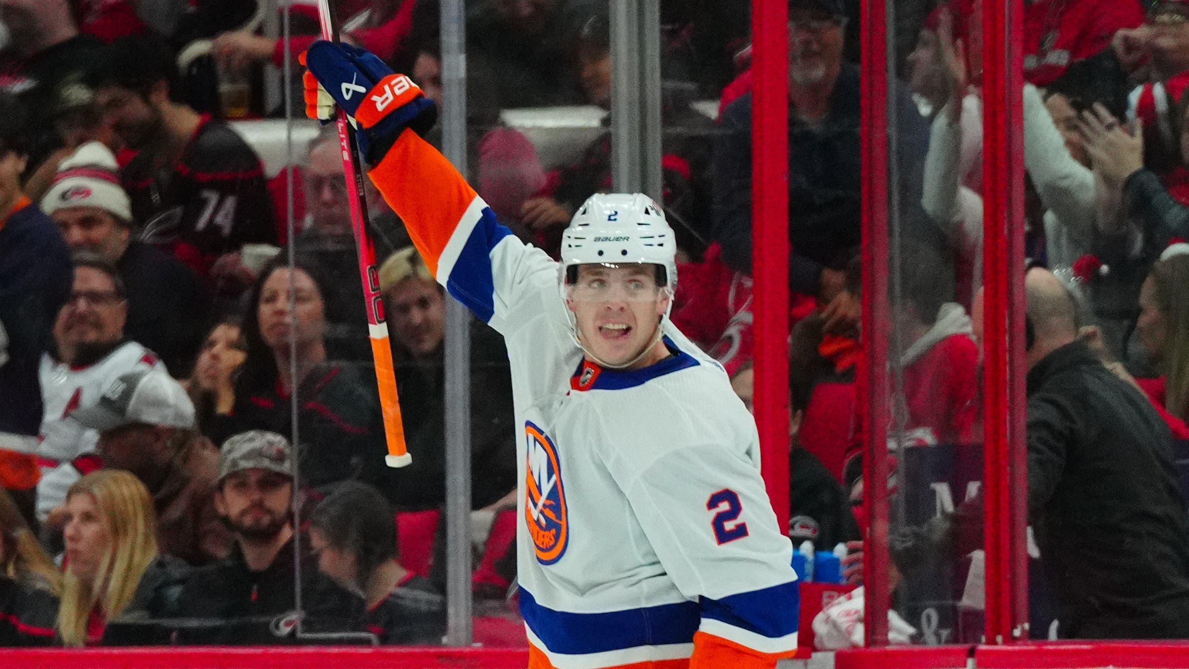 New York Islanders defensemen Mike Reilly (2) celebrates his goal against the Carolina Hurricanes during the second period at PNC Arena. / James Guillory-USA TODAY Sports