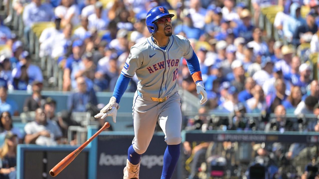 New York Mets shortstop Francisco Lindor (12) hits a solo home run in the first inning against the Los Angeles Dodgers during game two of the NLCS for the 2024 MLB Playoffs at Dodger Stadium.