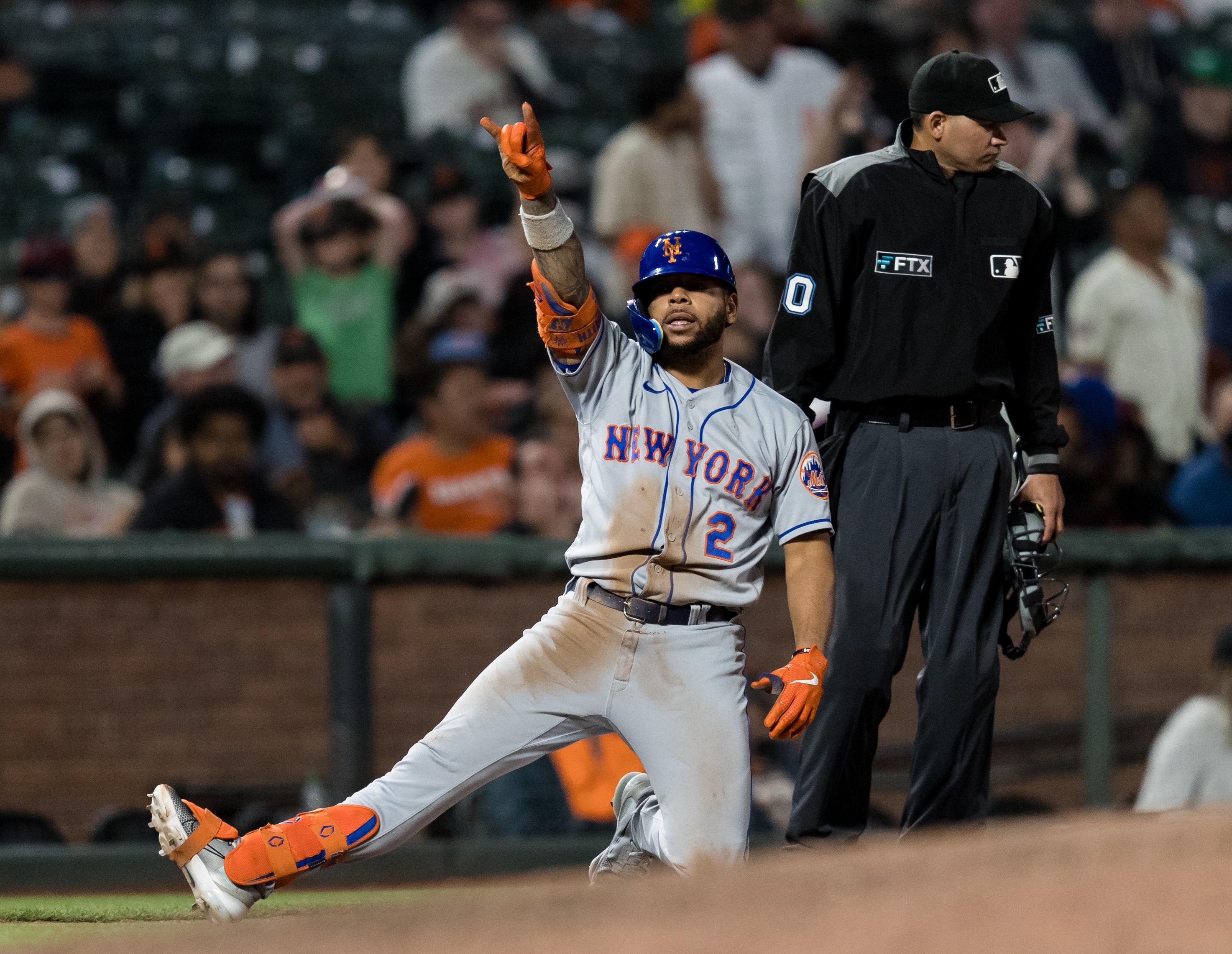 New York Mets first baseman Dominic Smith (2) reacts after hitting a staple against the San Francisco Giants during the ninth inning at Oracle Park.