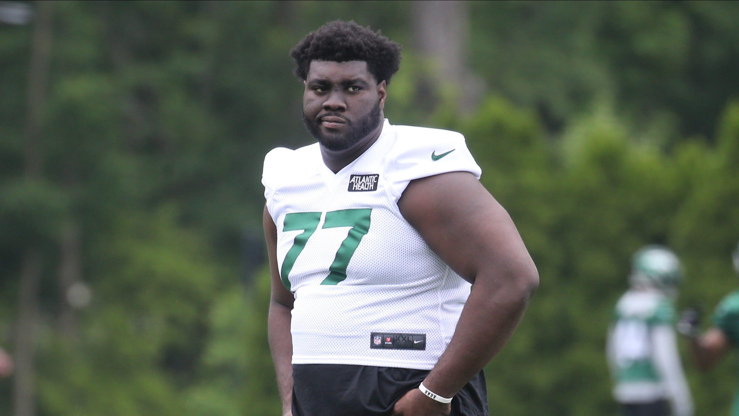 Sidelined offensive lineman Mekhi Becton watching practice as the New York Jets held OTA's this morning at their practice facility in Florham Park, NJ on June 4, 2021. The New York Jets Held Ota S This Morning At Their Practice Facility In Florham Park Nj On June 4 2021