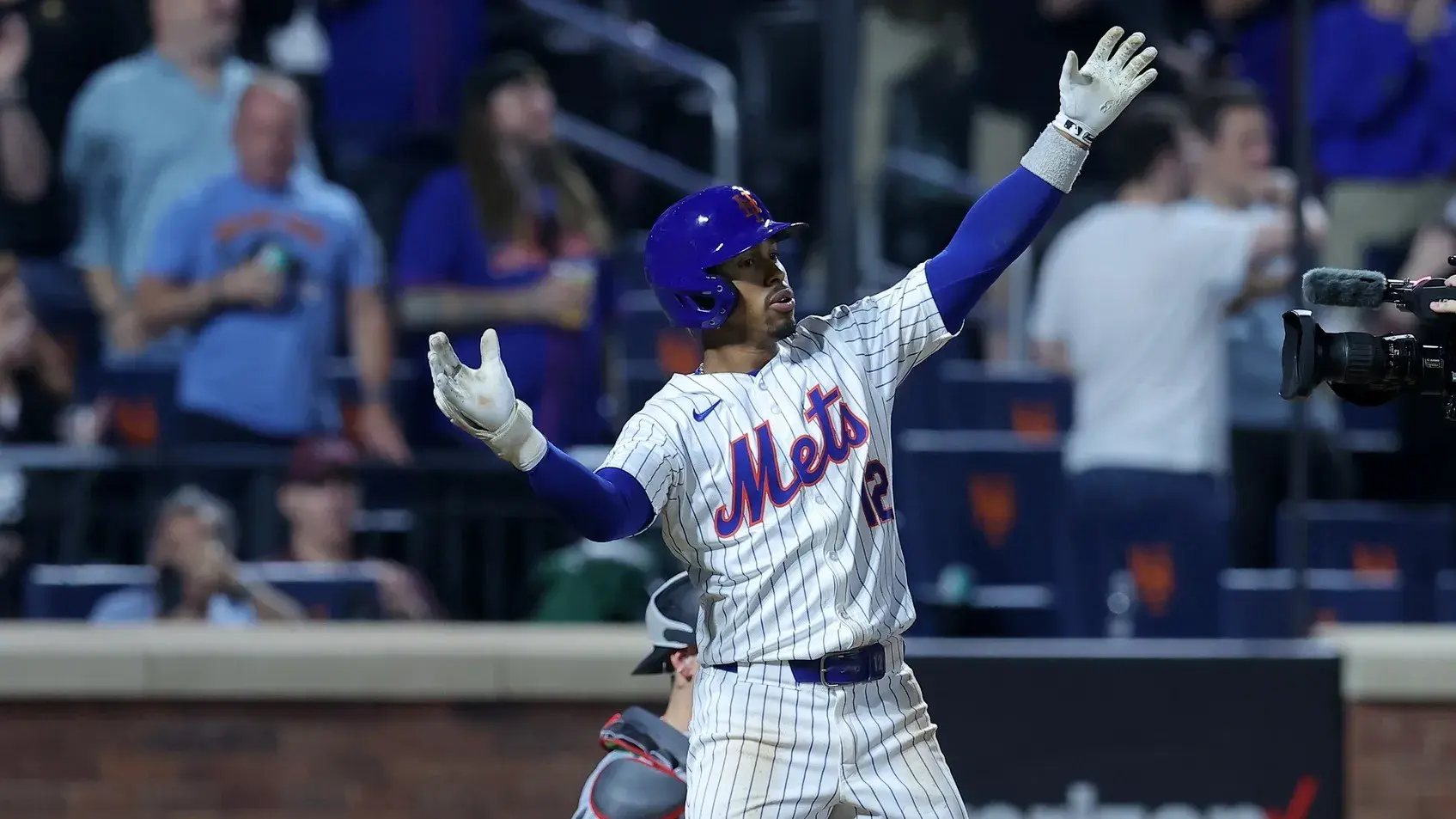 New York Mets shortstop Francisco Lindor (12) reacts after hitting a solo home run during the eighth inning against the Miami Marlins at Citi Field. / Brad Penner-USA TODAY Sports