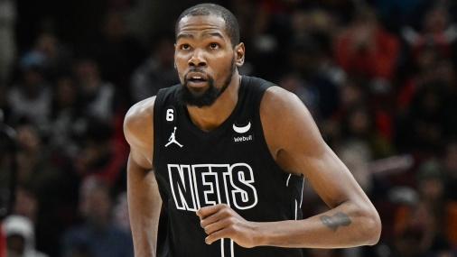 Brooklyn Nets forward Kevin Durant (7) reacts after making a three-point basket in the first half against the Chicago Bulls at United Center