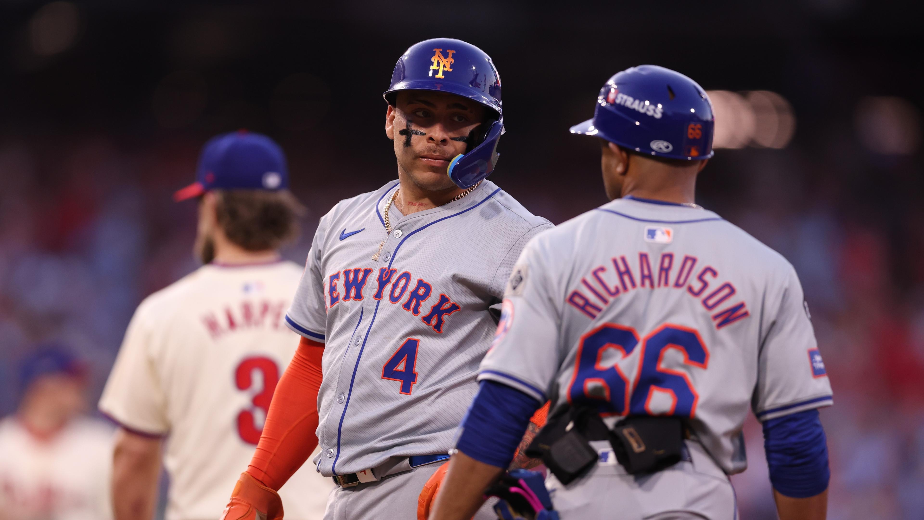 Oct 5, 2024; Philadelphia, PA, USA; New York Mets catcher Francisco Alvarez (4) reacts after hitting a single in the eighth inning against the Philadelphia Phillies in game one of the NLDS for the 2024 MLB Playoffs at Citizens Bank Park. Mandatory Credit: Bill Streicher-Imagn Images