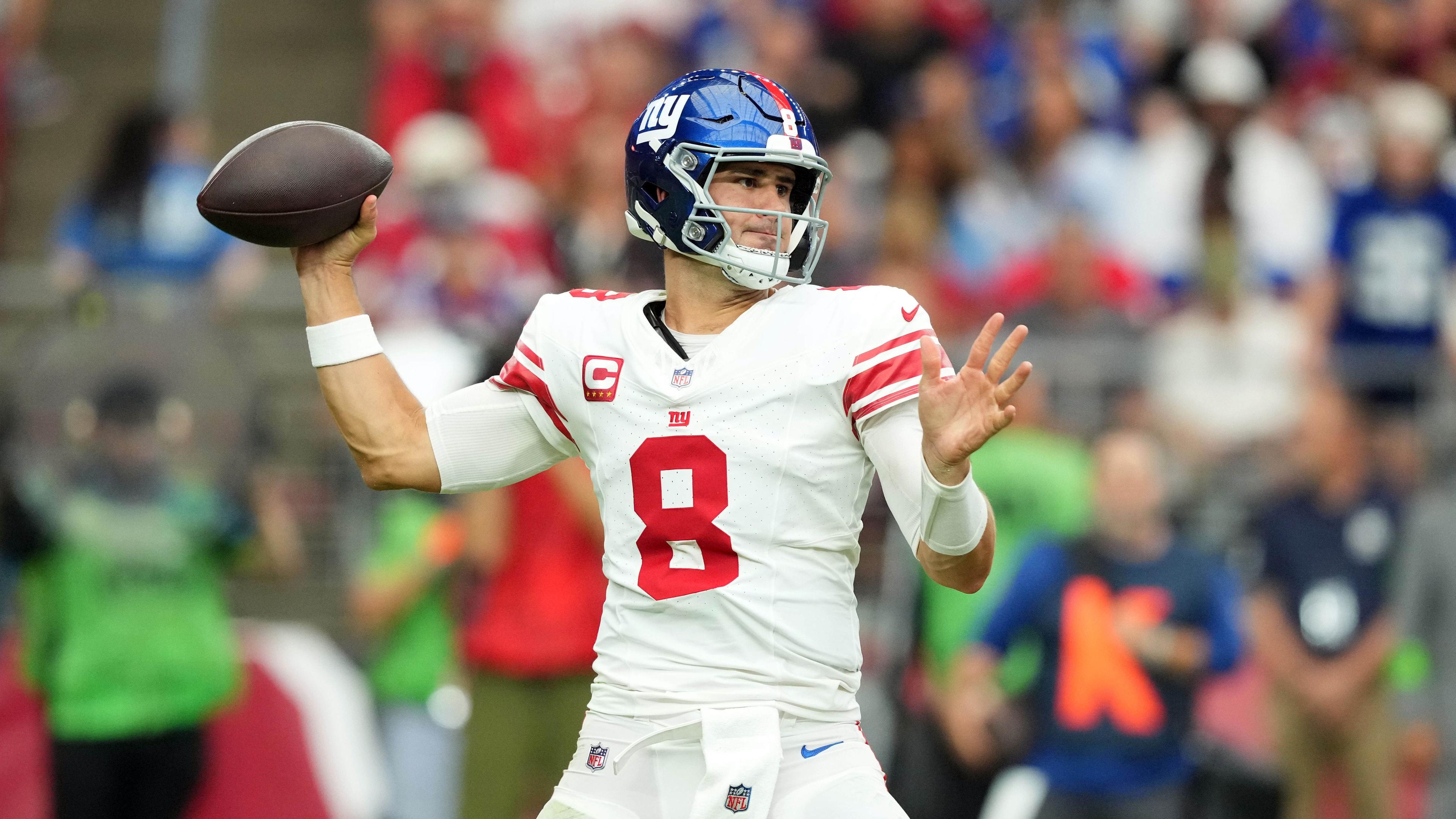 Sep 17, 2023; Glendale, Arizona, USA; New York Giants quarterback Daniel Jones (8) passes against the Arizona Cardinals during the first half at State Farm Stadium. Mandatory Credit: Joe Camporeale-USA TODAY Sports