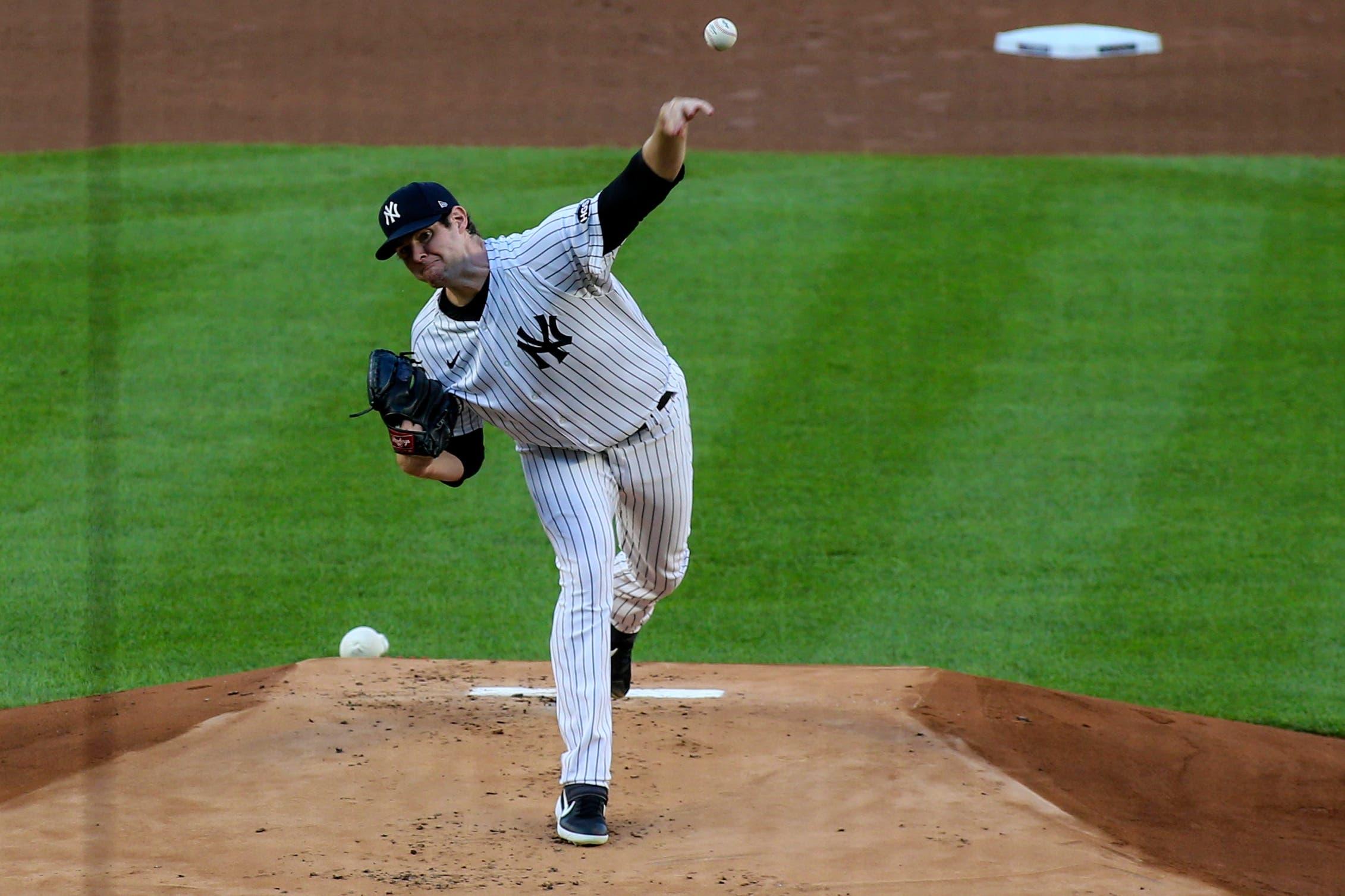 Jul 31, 2020; Bronx, New York, USA; New York Yankees pitcher Jordan Montgomery (47) pitches in the first inning against the Boston Red Sox at Yankee Stadium. Mandatory Credit: Wendell Cruz-USA TODAY Sports / Wendell Cruz-USA TODAY Sports