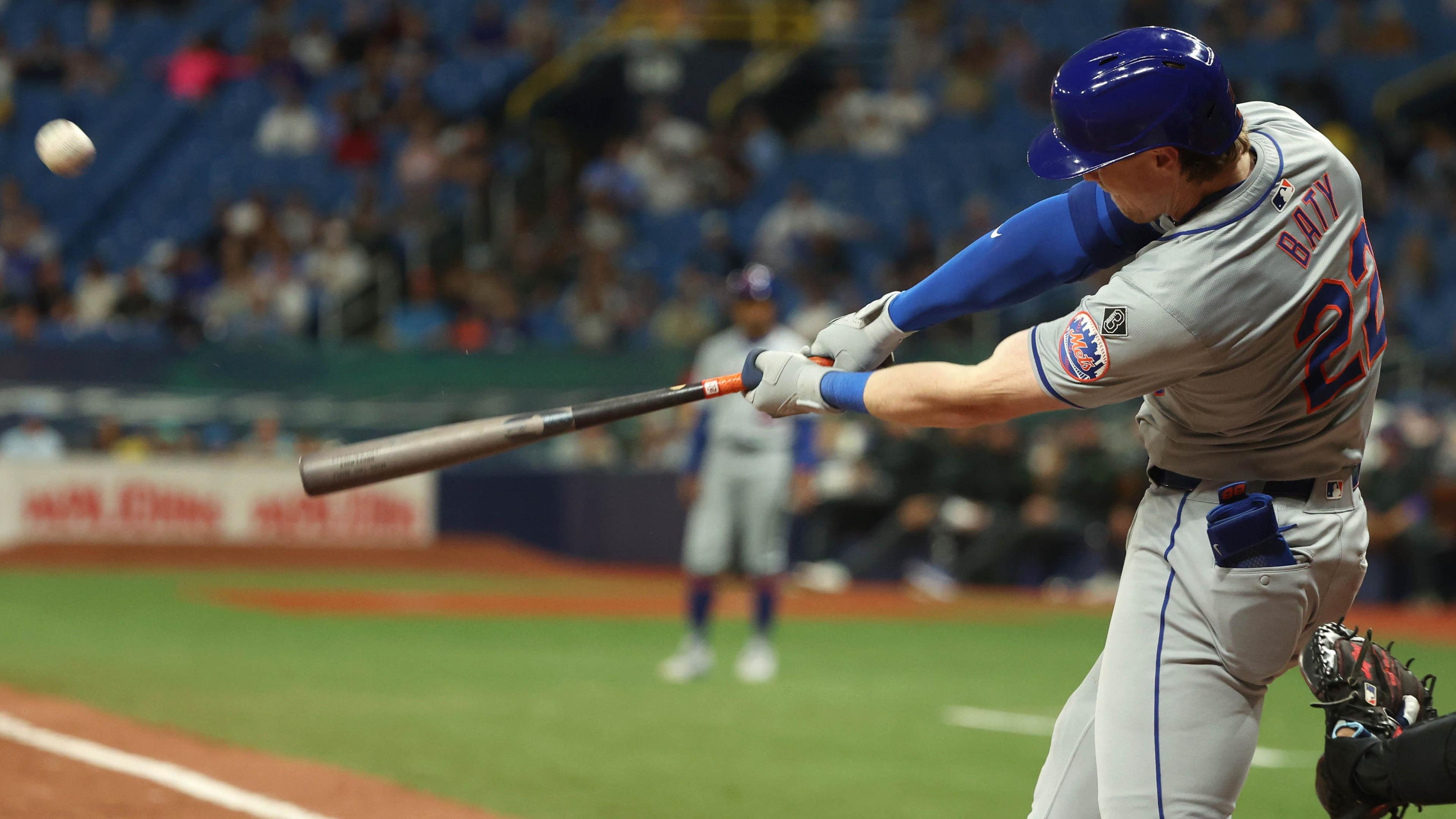 New York Mets third base Brett Baty (22) hits a home run against the Tampa Bay Rays during the ninth inning at Tropicana Field / Kim Klement Neitzel - USA TODAY Sports