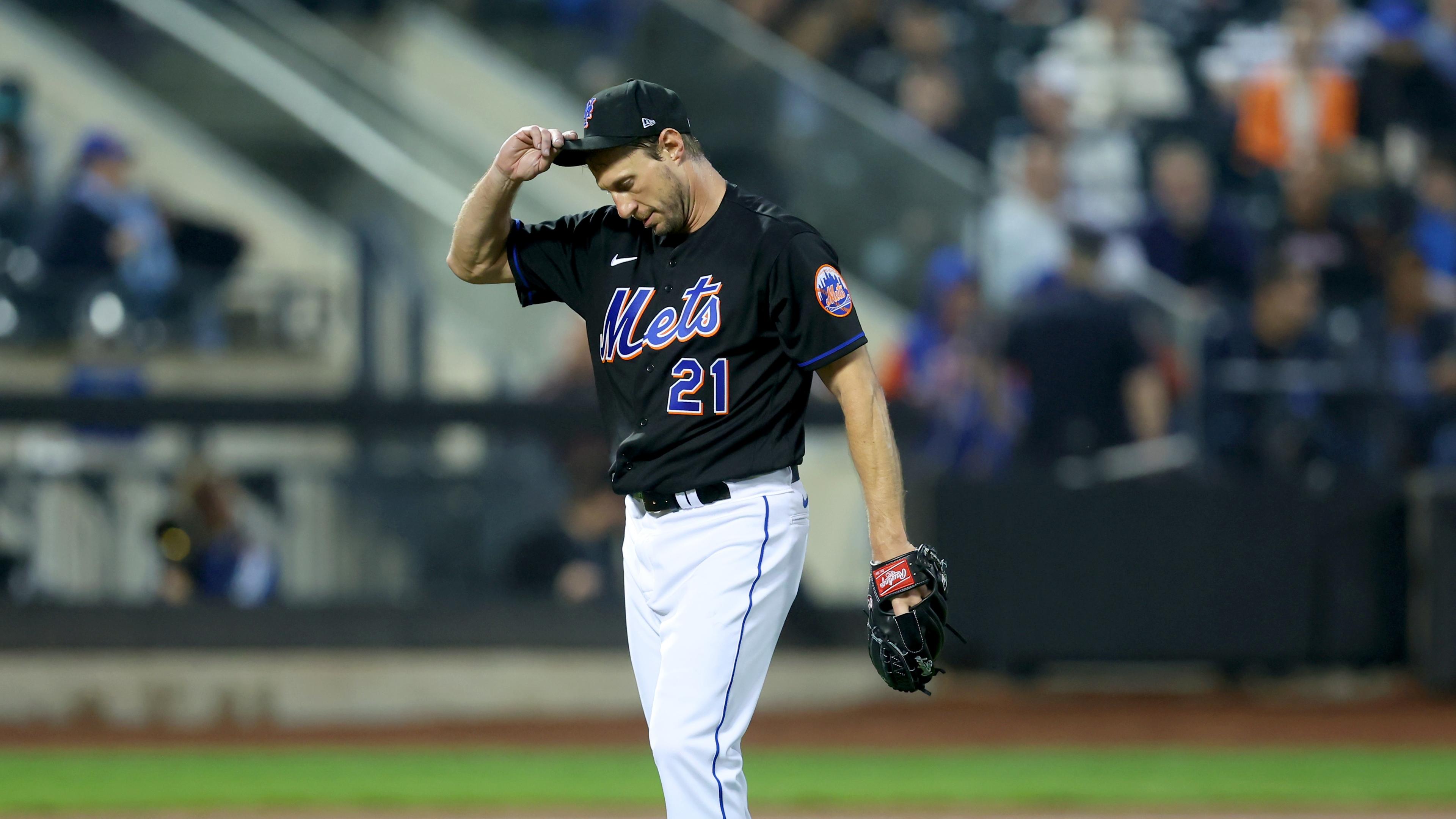 May 13, 2022; New York City, New York, USA; New York Mets starting pitcher Max Scherzer (21) reacts after hitting Seattle Mariners first baseman Ty France (not pictured) with a pitch during the fourth inning at Citi Field. Mandatory Credit: Brad Penner-USA TODAY Sports