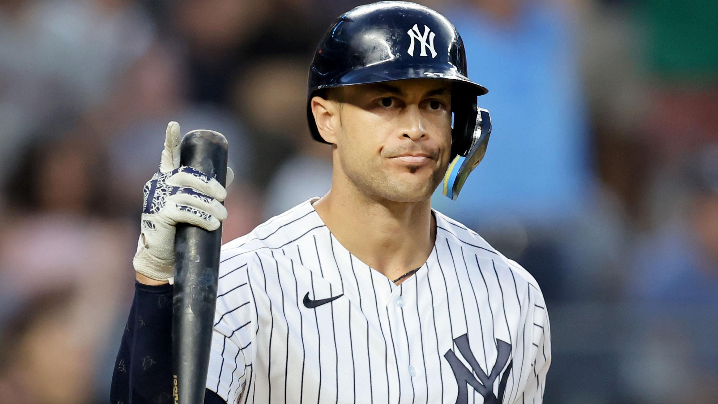 Jul 15, 2022; Bronx, New York, USA; New York Yankees right fielder Giancarlo Stanton (27) reacts as he rounds the bases after hitting a three run home run against the Boston Red Sox during the third inning at Yankee Stadium.