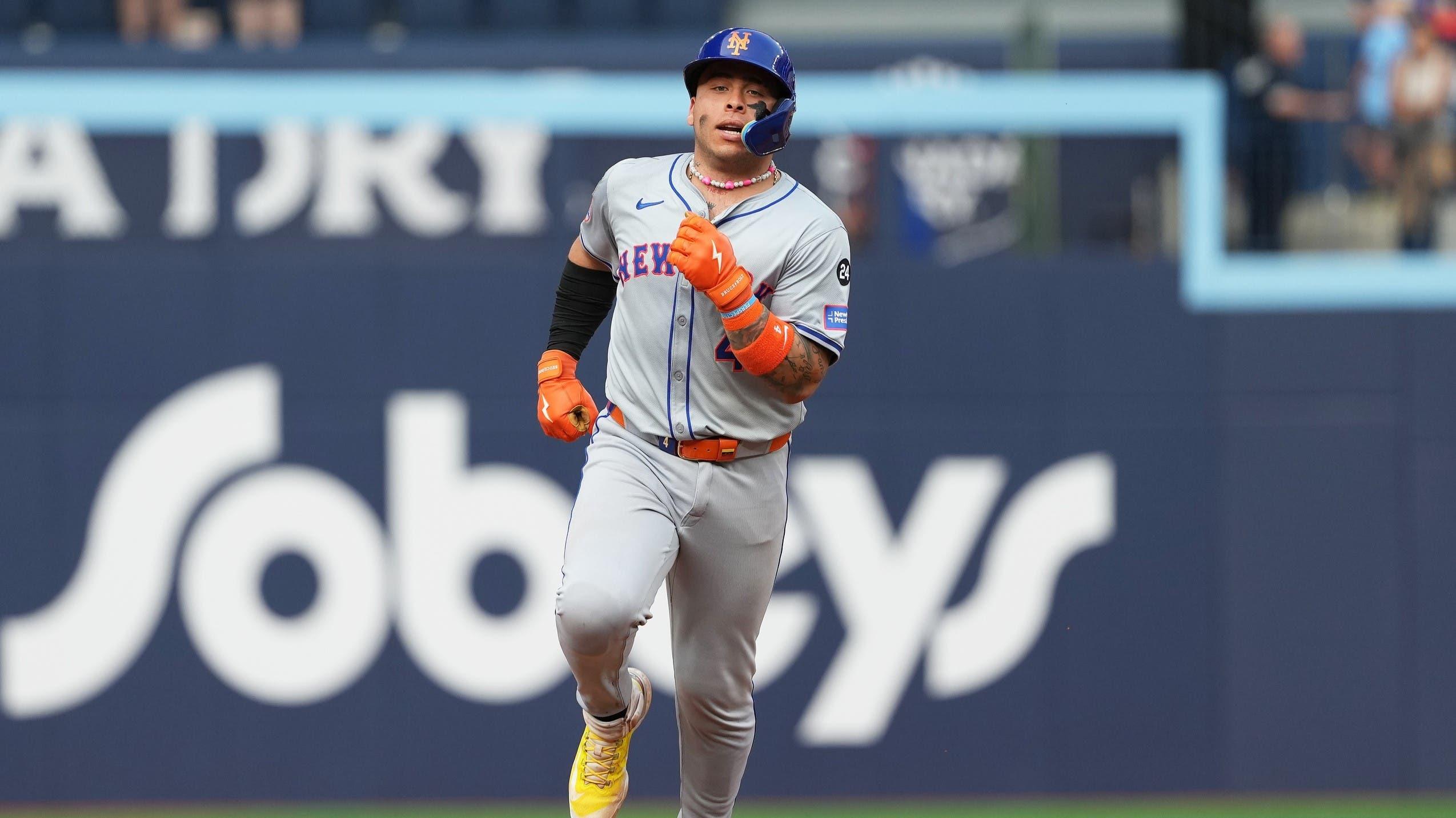 Sep 11, 2024; Toronto, Ontario, CAN; New York Mets catcher Francisco Alvarez (4) runs the bases after hitting a three run home run against the Toronto Blue Jays during the ninth inning at Rogers Centre. / Nick Turchiaro-Imagn Images