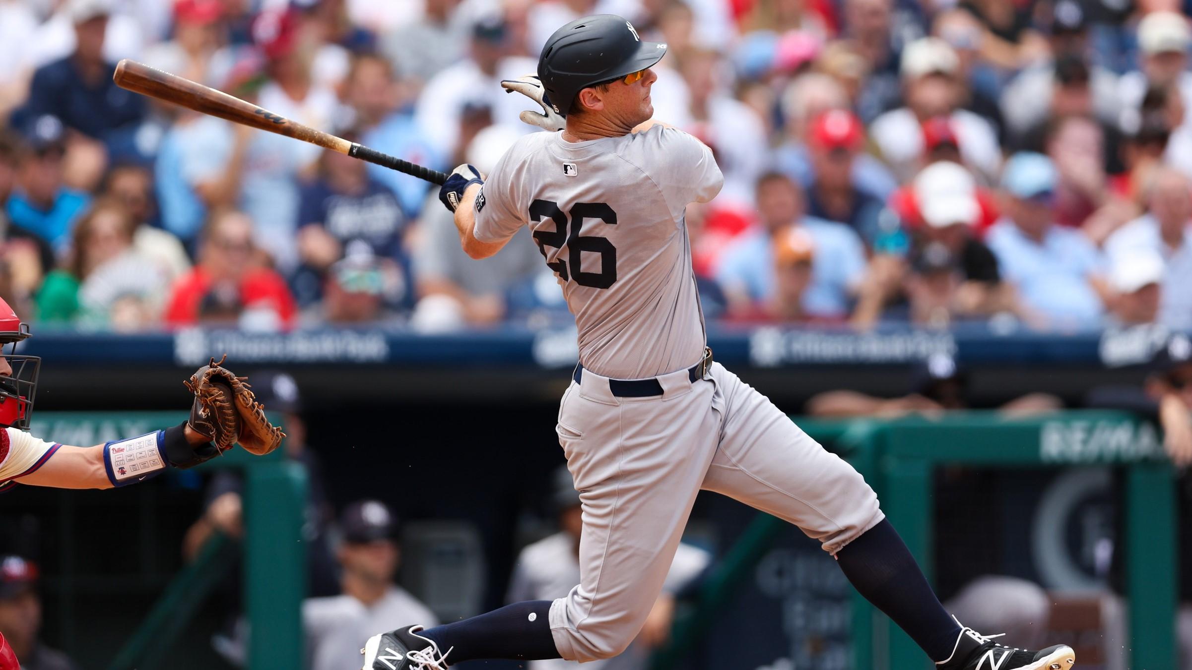 Jul 31, 2024; Philadelphia, Pennsylvania, USA; New York Yankees third base DJ LeMahieu (26) hits a four RBI grand slam during the second inning against the Philadelphia Phillies at Citizens Bank Park.