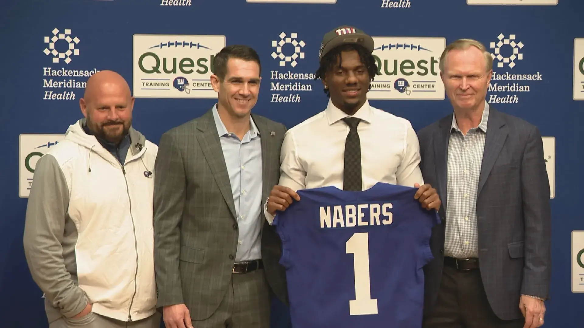 Malik Nabers with Brian Daboll, Joe Schoen, and John Mara at introductory news conference / SNY