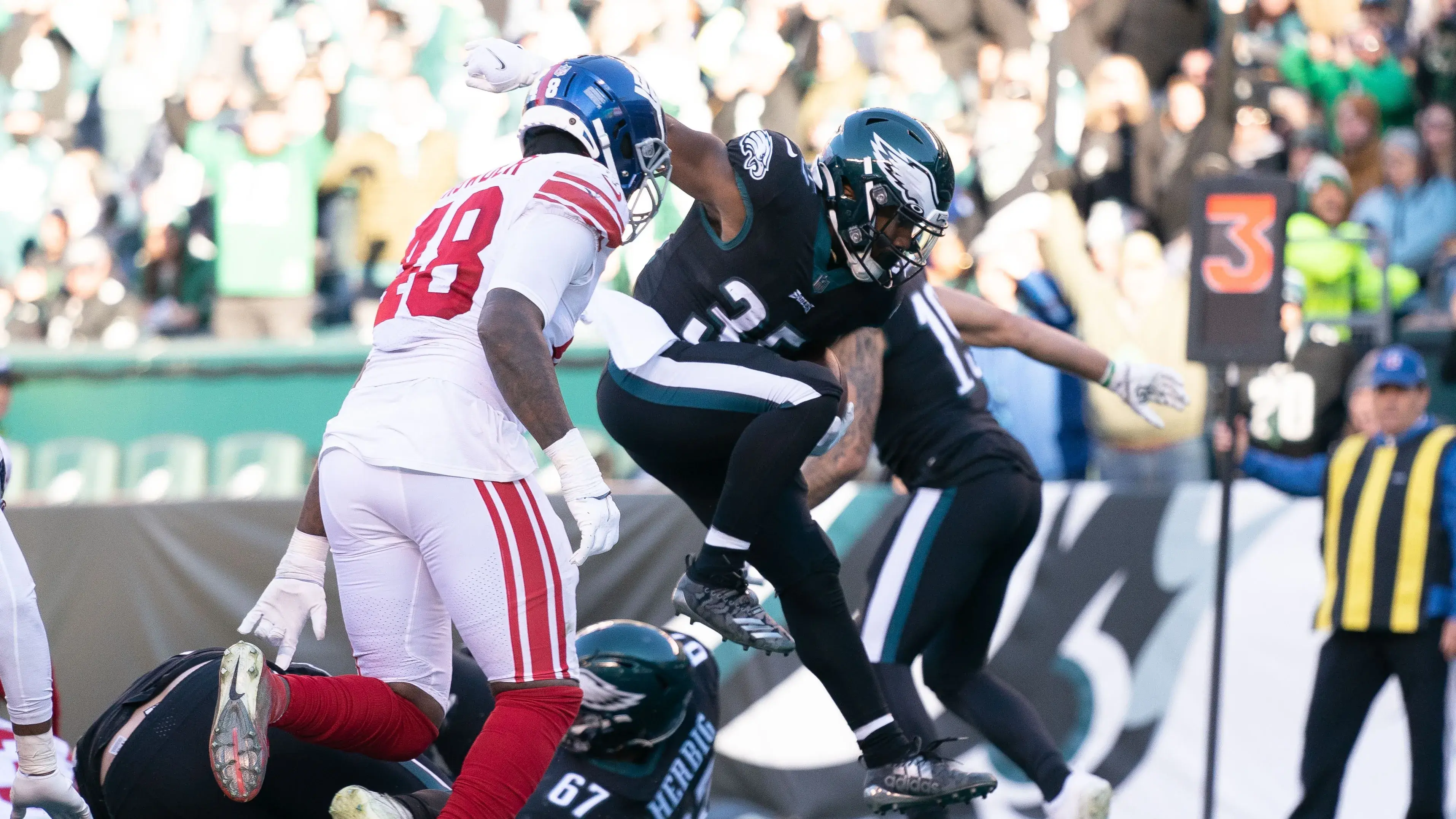 Dec 26, 2021; Philadelphia, Pennsylvania, USA; Philadelphia Eagles running back Boston Scott (35) runs for a touchdown against the New York Giants during the third quarter at Lincoln Financial Field / Bill Streicher-USA TODAY Sports