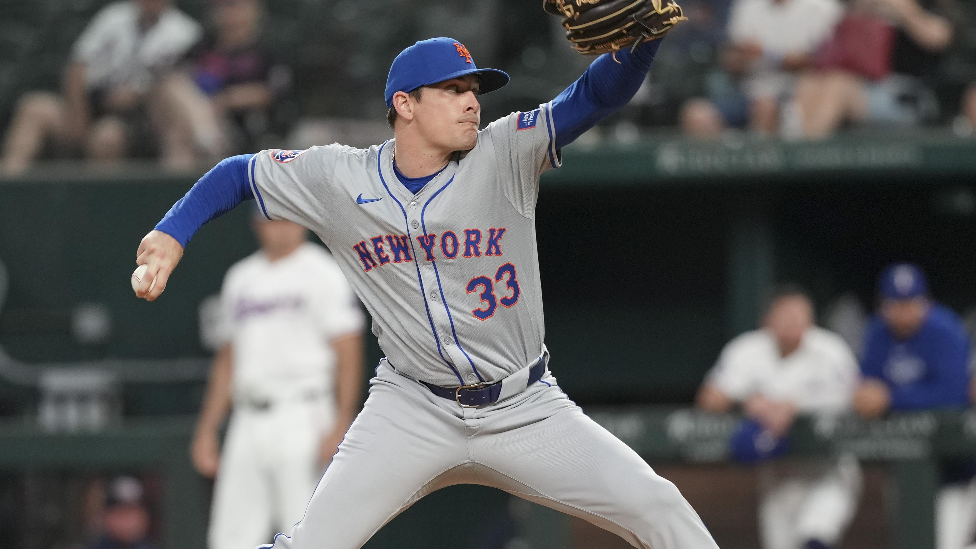 New York Mets relief pitcher Drew Smith (33) delivers a pitch to the Texas Rangers during the ninth inning at Globe Life Field