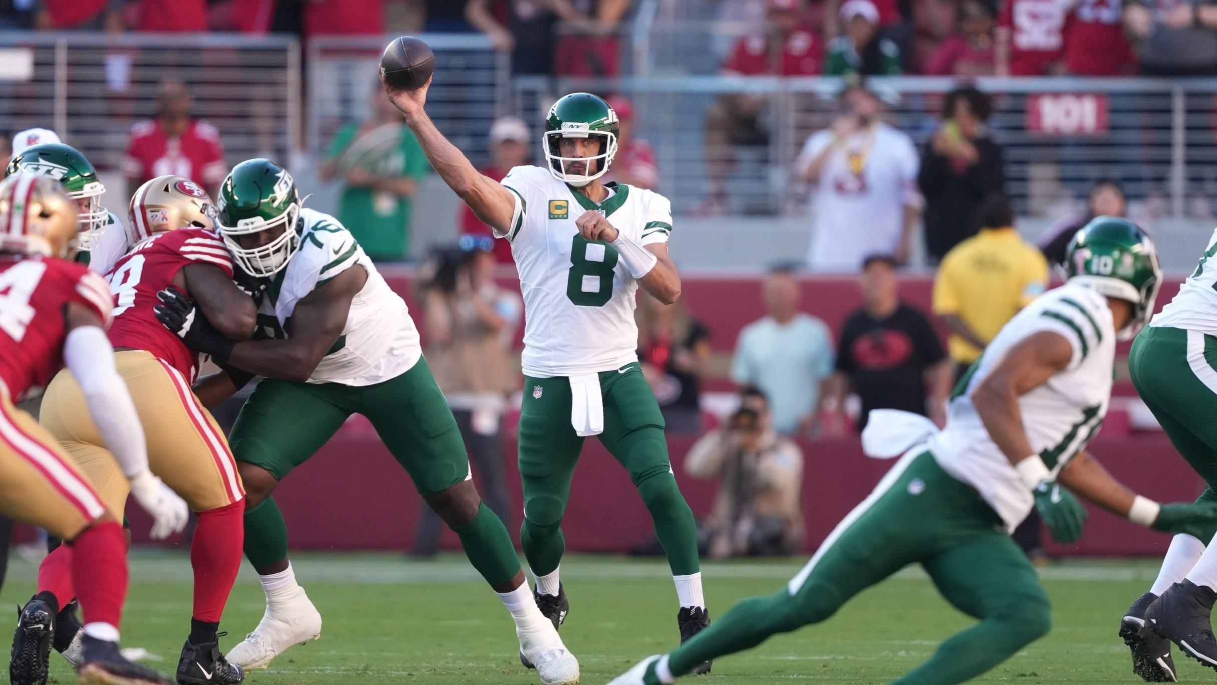 New York Jets quarterback Aaron Rodgers (8) throws a pass against the San Francisco 49ers during the first quarter at Levi's Stadium.