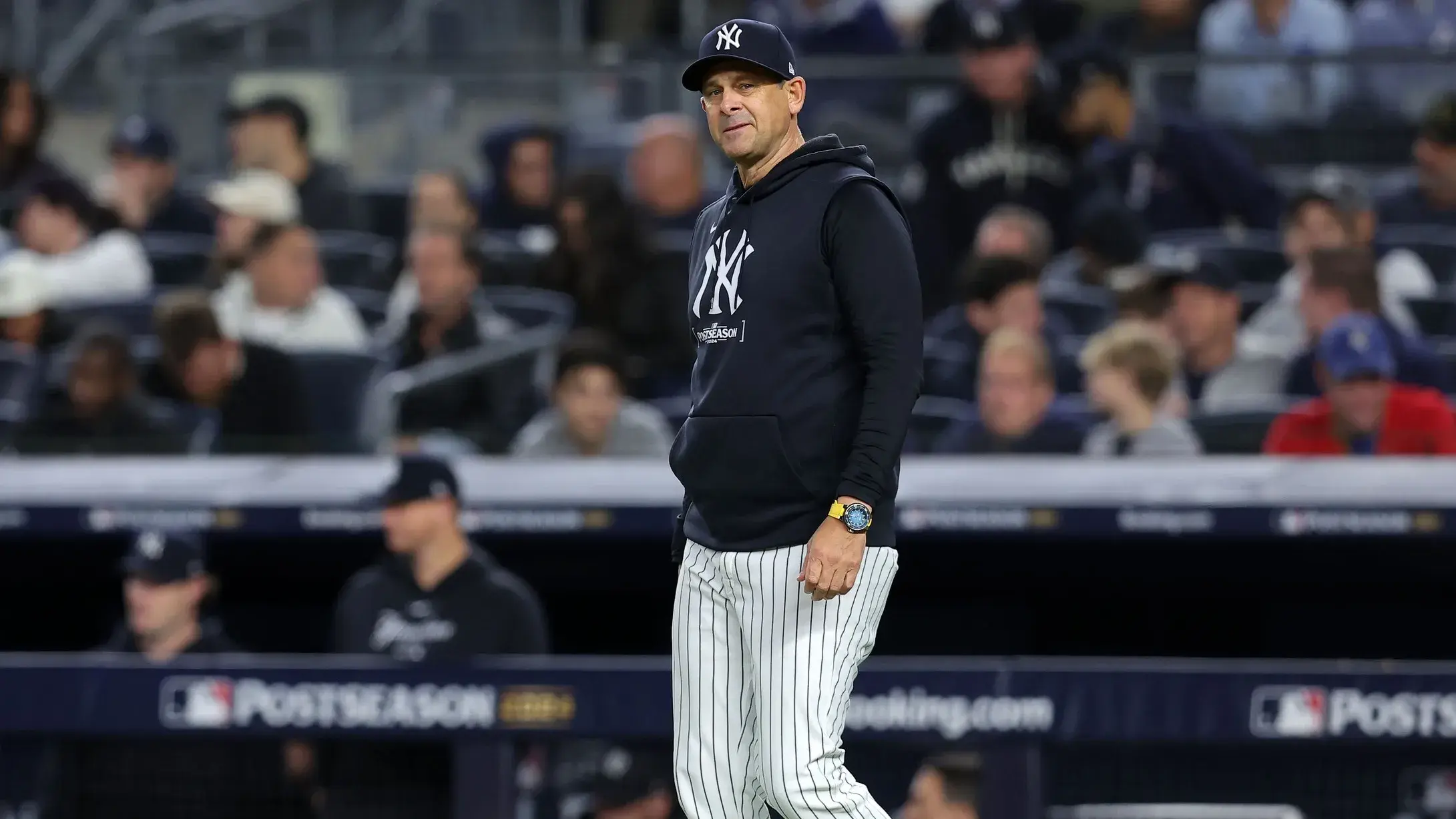 New York Yankees manager Aaron Boone (17) walks to the mound for a pitching change against the Kansas City Royals in the sixth inning during game two of the ALDS for the 2024 MLB Playoffs at Yankee Stadium. / Brad Penner-Imagn Images