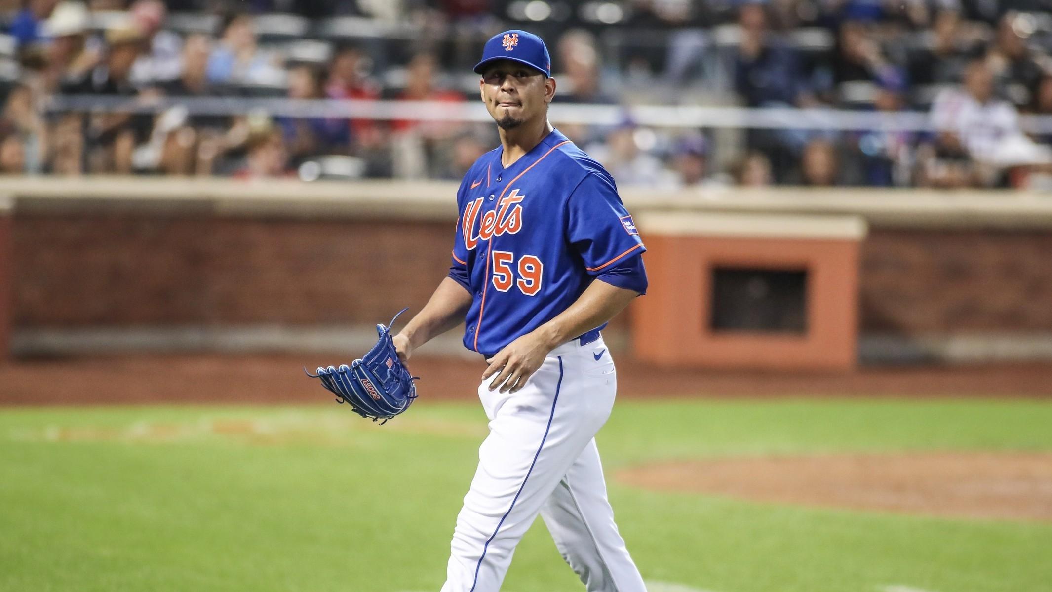 New York Mets starting pitcher Carlos Carrasco (59) walks off the field after being taken out in the second inning against the Los Angeles Angels at Citi Field.