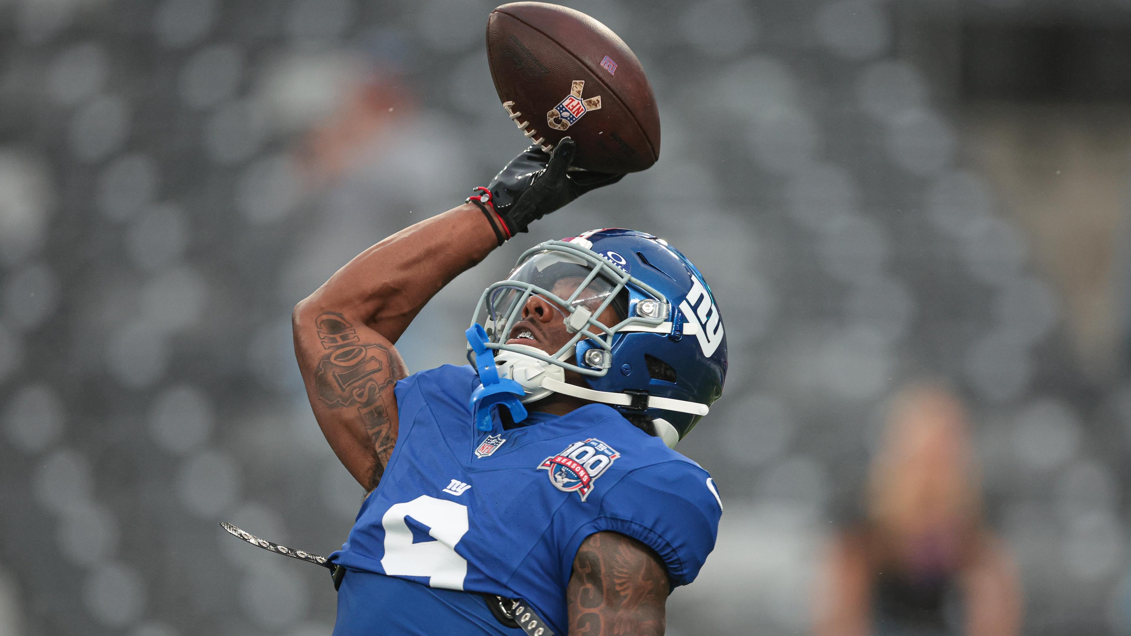 Aug 8, 2024; East Rutherford, New Jersey, USA; New York Giants wide receiver Malik Nabers (9) makes a catch during warm ups before the game against the Detroit Lions at MetLife Stadium. Mandatory Credit: Vincent Carchietta-USA TODAY Sports