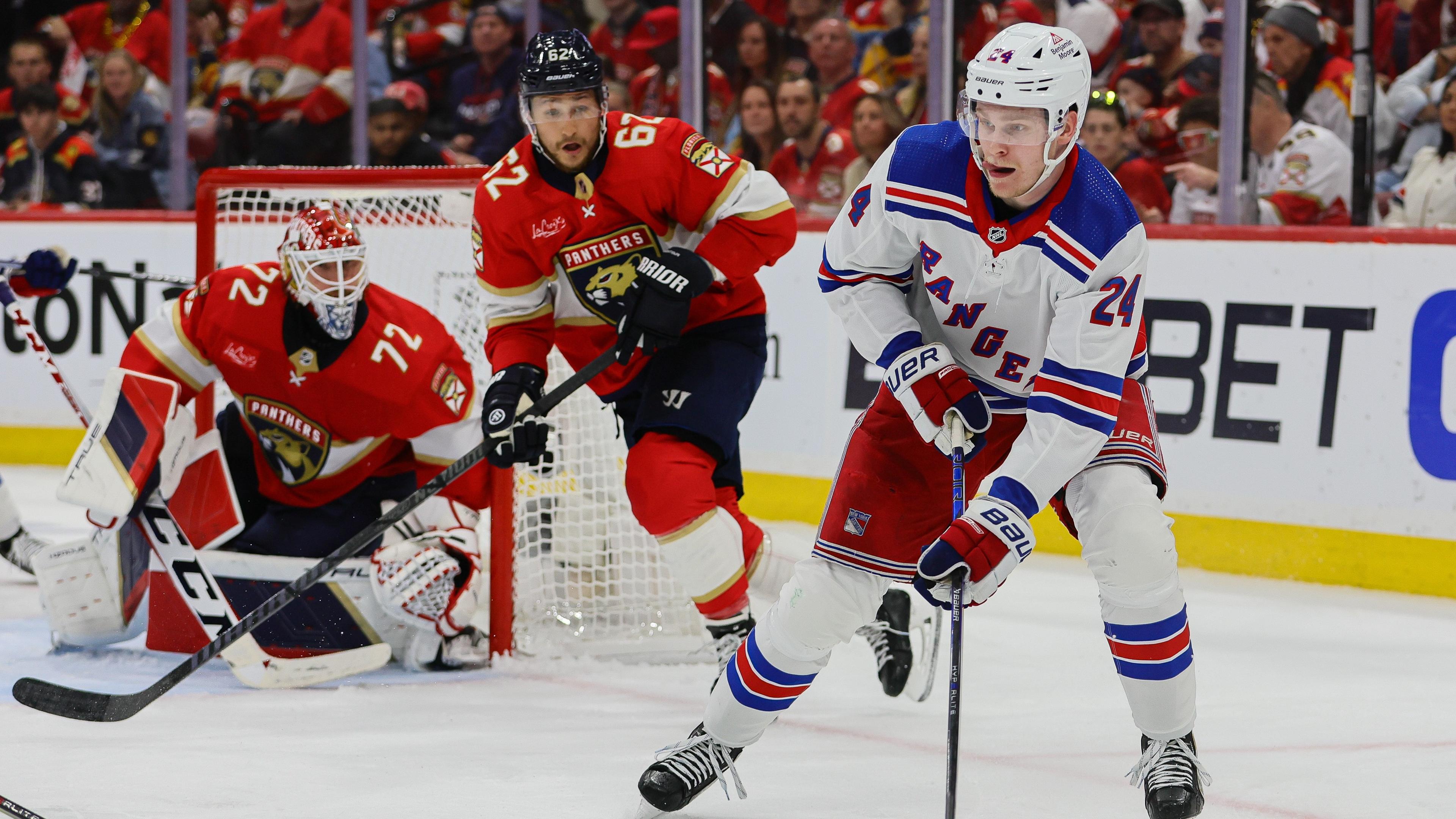 May 26, 2024; Sunrise, Florida, USA; New York Rangers right wing Kaapo Kakko (24) moves the puck against the Florida Panthers during the second period in game three of the Eastern Conference Final of the 2024 Stanley Cup Playoffs at Amerant Bank Arena. Mandatory Credit: Sam Navarro-USA TODAY Sports