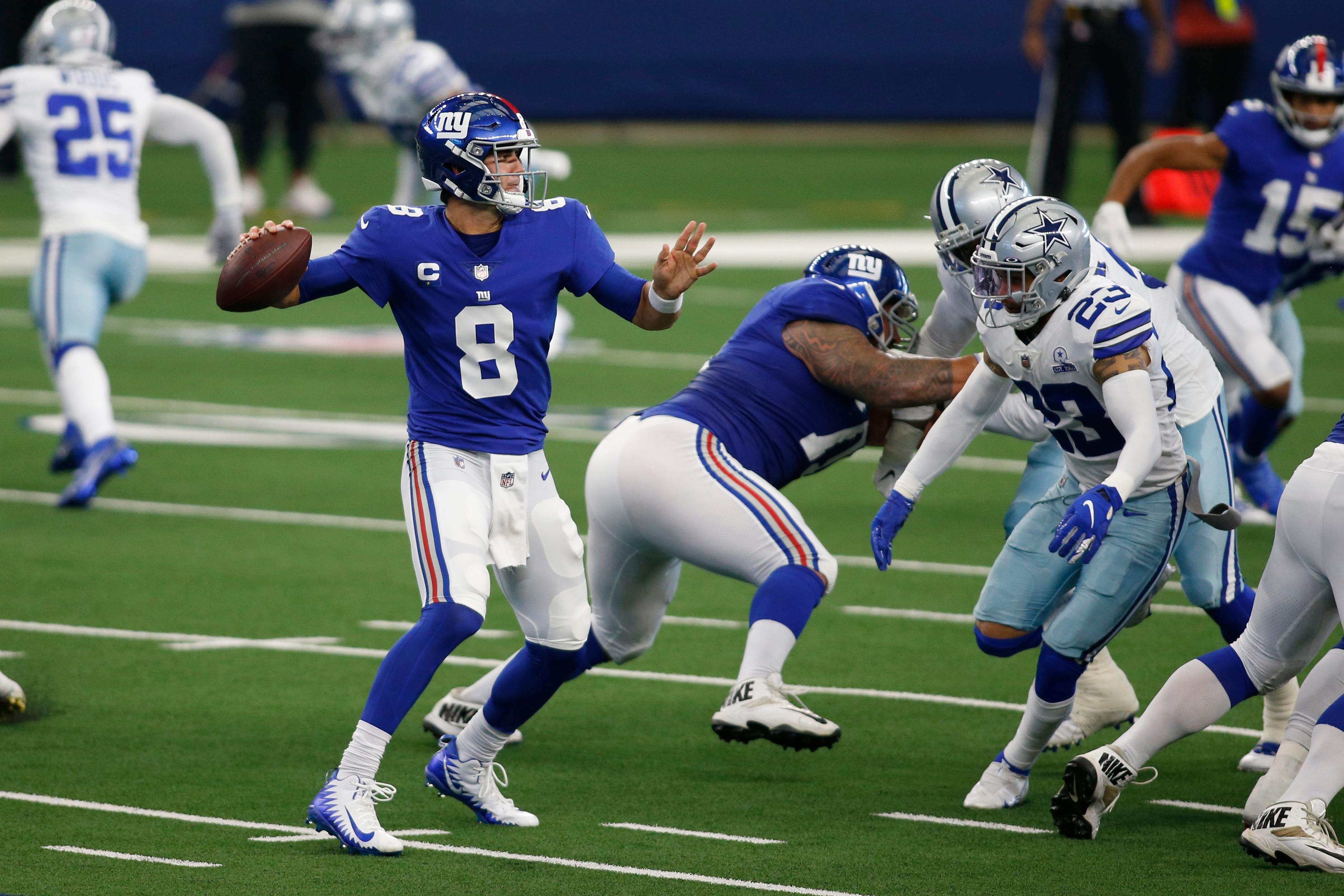 Oct 11, 2020; Arlington, Texas, USA; New York Giants quarterback Daniel Jones (8) throws a pass in the second quarter against the Dallas Cowboys at AT&T Stadium.