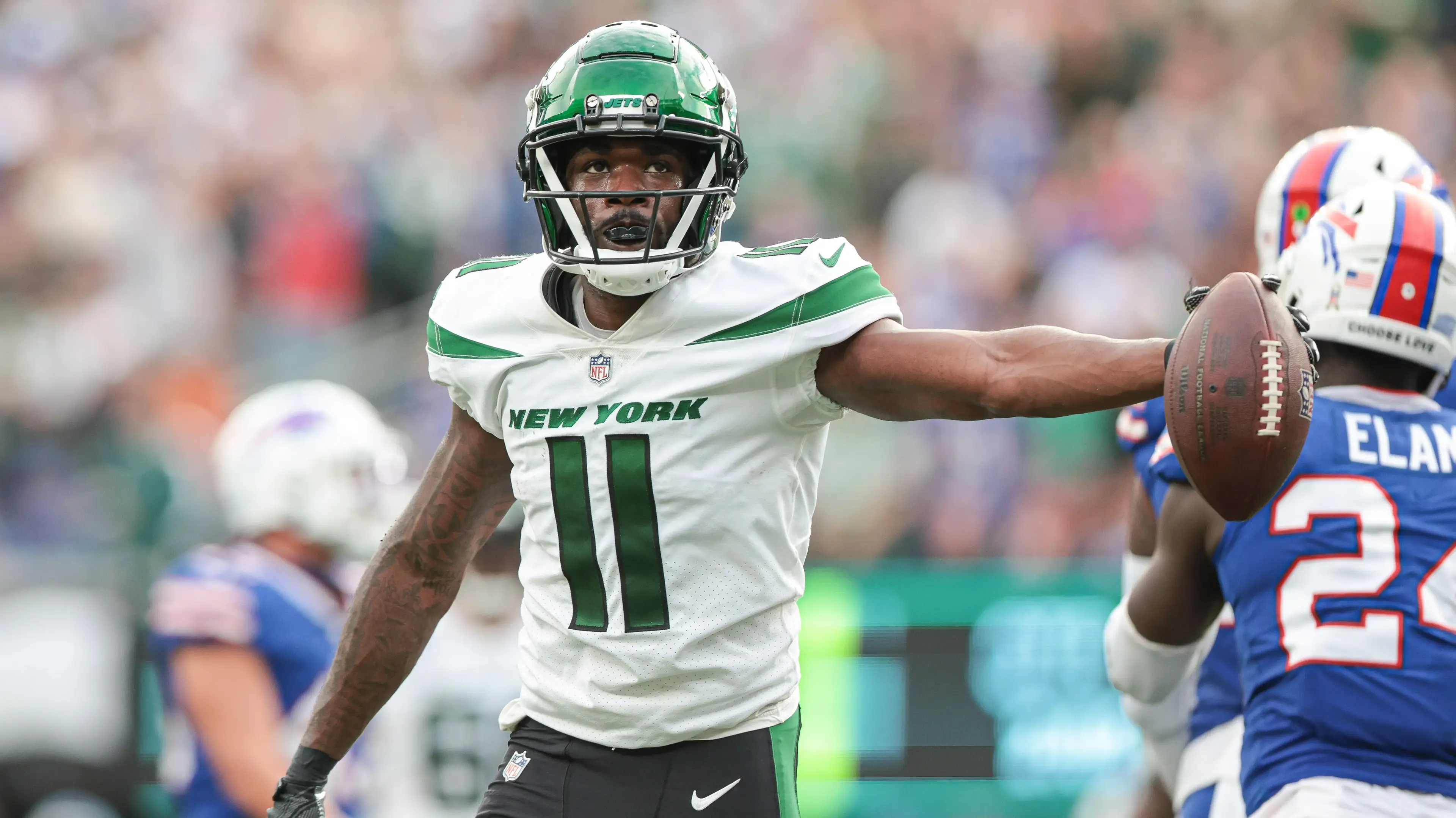 Nov 6, 2022; East Rutherford, New Jersey, USA; New York Jets wide receiver Denzel Mims (11) reacts after making a catch during the fourth quarter against the Buffalo Bills at MetLife Stadium. Mandatory Credit: Vincent Carchietta-USA TODAY Sports / © Vincent Carchietta-USA TODAY Sports