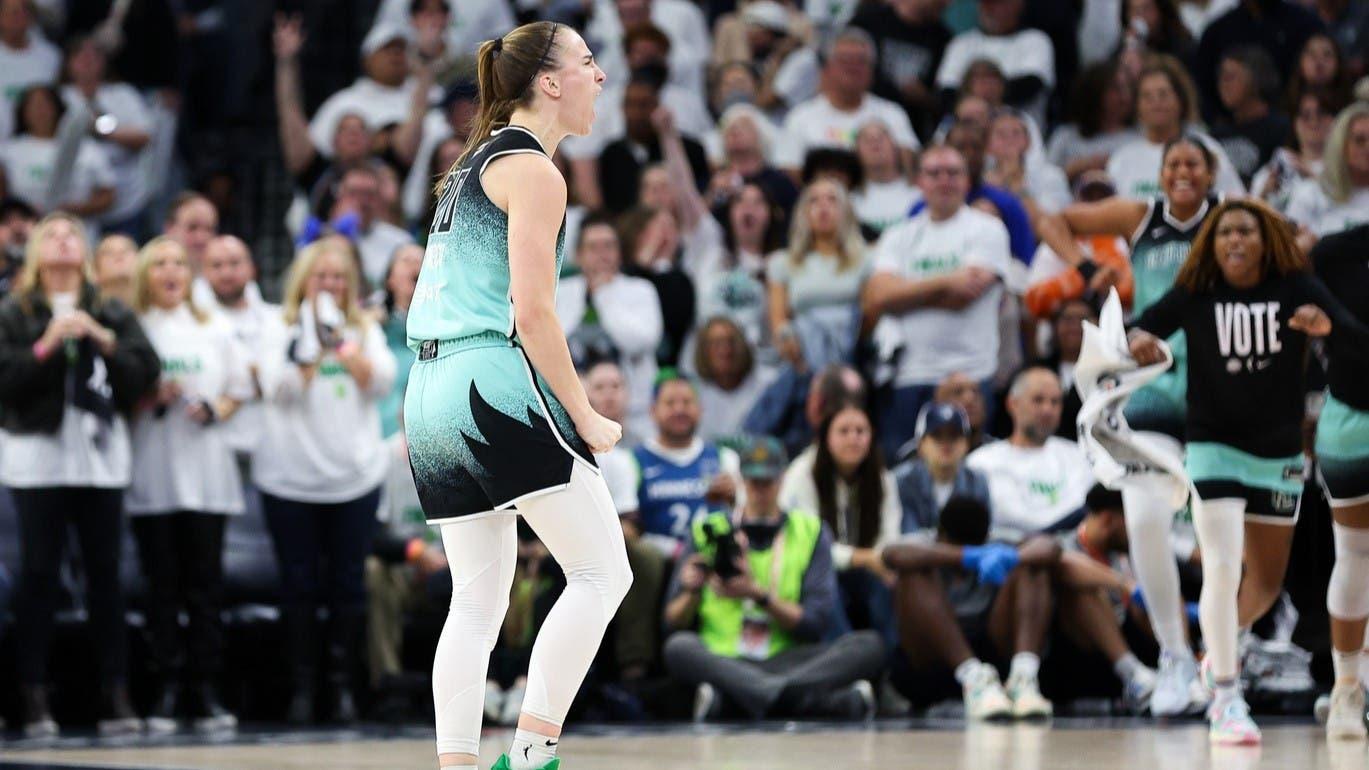 Oct 16, 2024; Minneapolis, Minnesota, USA; New York Liberty guard Sabrina Ionescu (20) celebrates her 3-point basket against the Minnesota Lynx during the second half of game three of the 2024 NBA Finals at Target Center. / Matt Krohn-Imagn Images