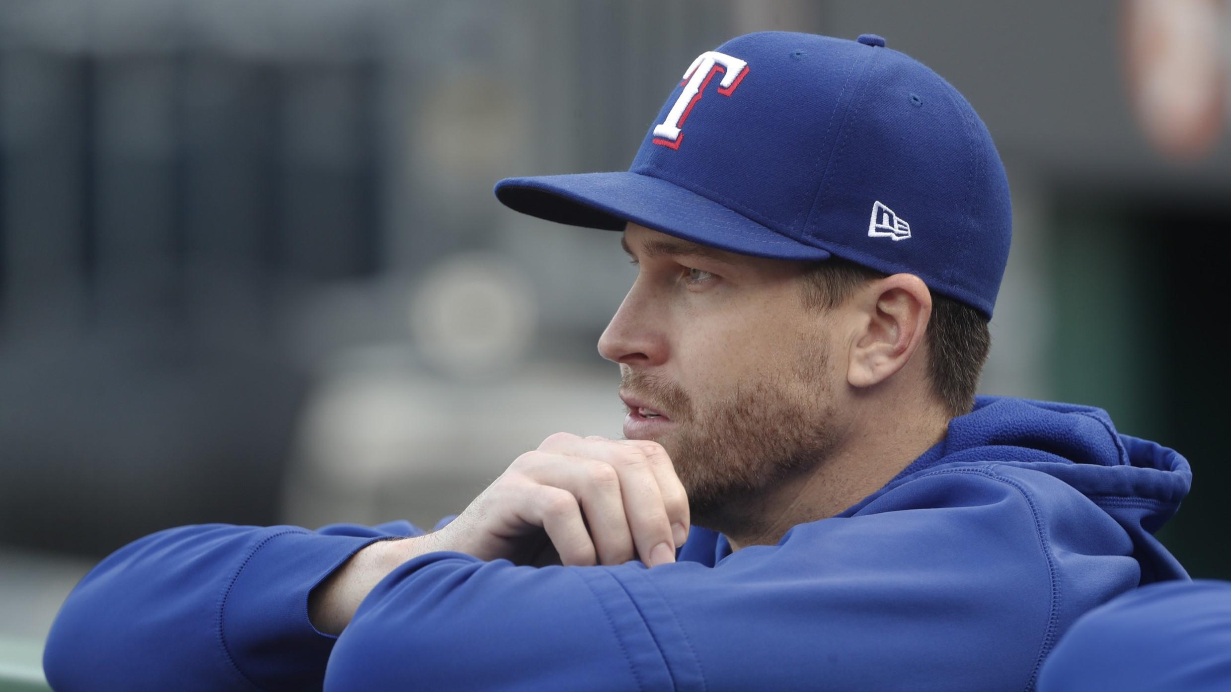 May 23, 2023; Pittsburgh, Pennsylvania, USA; Texas Rangers pitcher Jacob deGrom (48) looks on from the dugout before the game against the Pittsburgh Pirates at PNC Park.