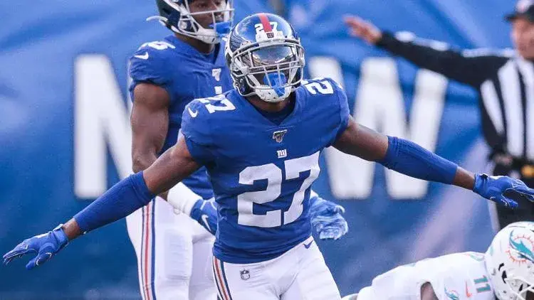 Dec 15, 2019; East Rutherford, NJ, USA; New York Giants cornerback Deandre Baker (27) reacts after breaking up a pass intended for Miami Dolphins wide receiver DeVante Parker (11) during the first half at MetLife Stadium. / Vincent Carchietta - USA TODAY Sports