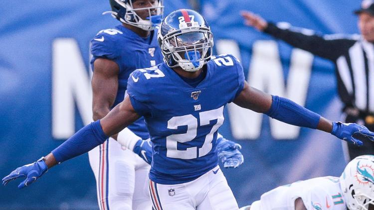 Dec 15, 2019; East Rutherford, NJ, USA; New York Giants cornerback Deandre Baker (27) reacts after breaking up a pass intended for Miami Dolphins wide receiver DeVante Parker (11) during the first half at MetLife Stadium.