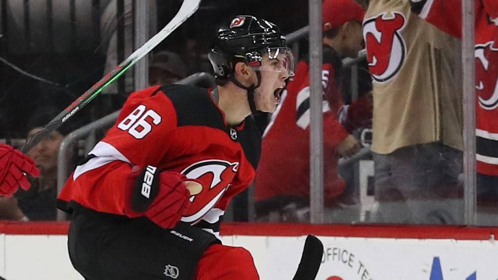 Oct 19, 2019; Newark, NJ, USA; New Jersey Devils center Jack Hughes (86) celebrates after scoring his first NHL goal during the first period of their game against the Vancouver Canucks at Prudential Center. Mandatory Credit: Ed Mulholland-USA TODAY Sports