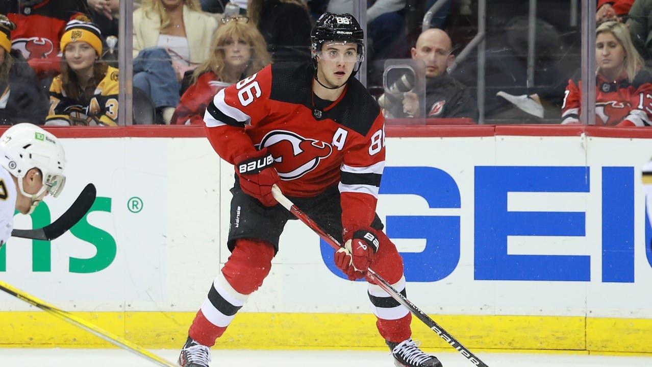 Dec 13, 2023; Newark, New Jersey, USA; New Jersey Devils center Jack Hughes (86) skates with the puck during the third period against the Boston Bruins at Prudential Center. / Vincent Carchietta-USA TODAY Sports