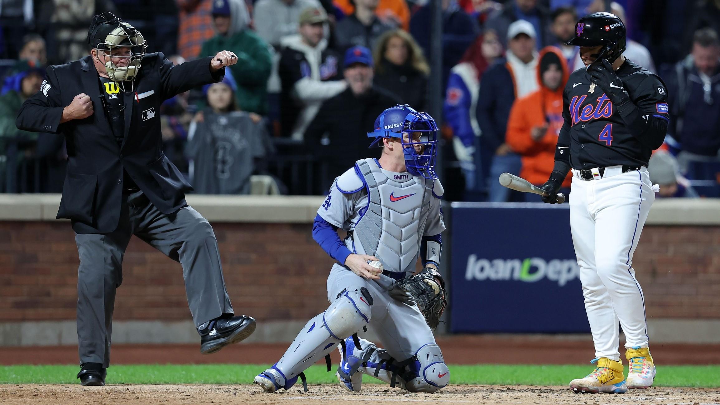 Oct 16, 2024; New York City, New York, USA;New York Mets catcher Francisco Alvarez (4) reacts after striking out against the Los Angeles Dodgers in the second inning during game three of the NLCS for the 2024 MLB playoffs at Citi Field.