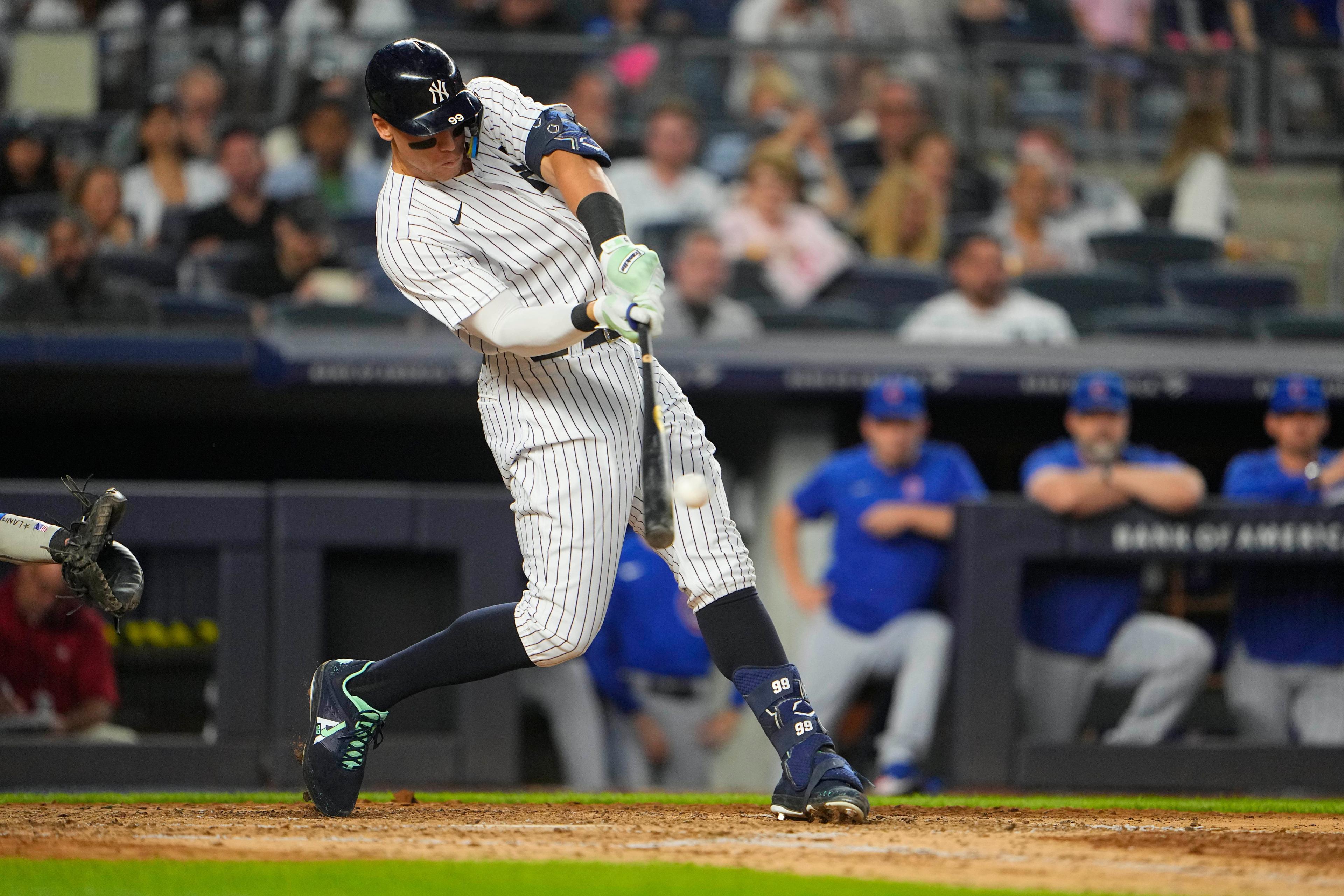 New York Yankees designated hitter Aaron Judge (99) hits a home run against the Chicago Cubs during the fifth inning at Yankee Stadium. / Gregory Fisher-USA TODAY Sports