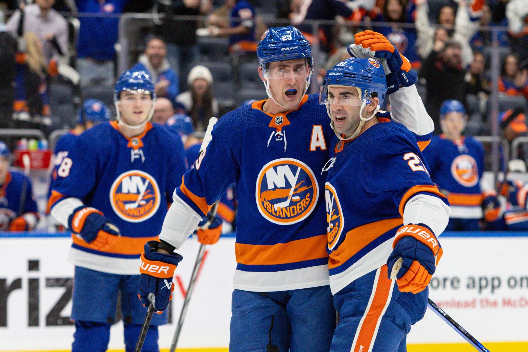 New York Islanders center Kyle Palmieri (21) celebrates his goal with New York Islanders center Brock Nelson (29) against the Toronto Maple Leafs during the second period at UBS Arena.