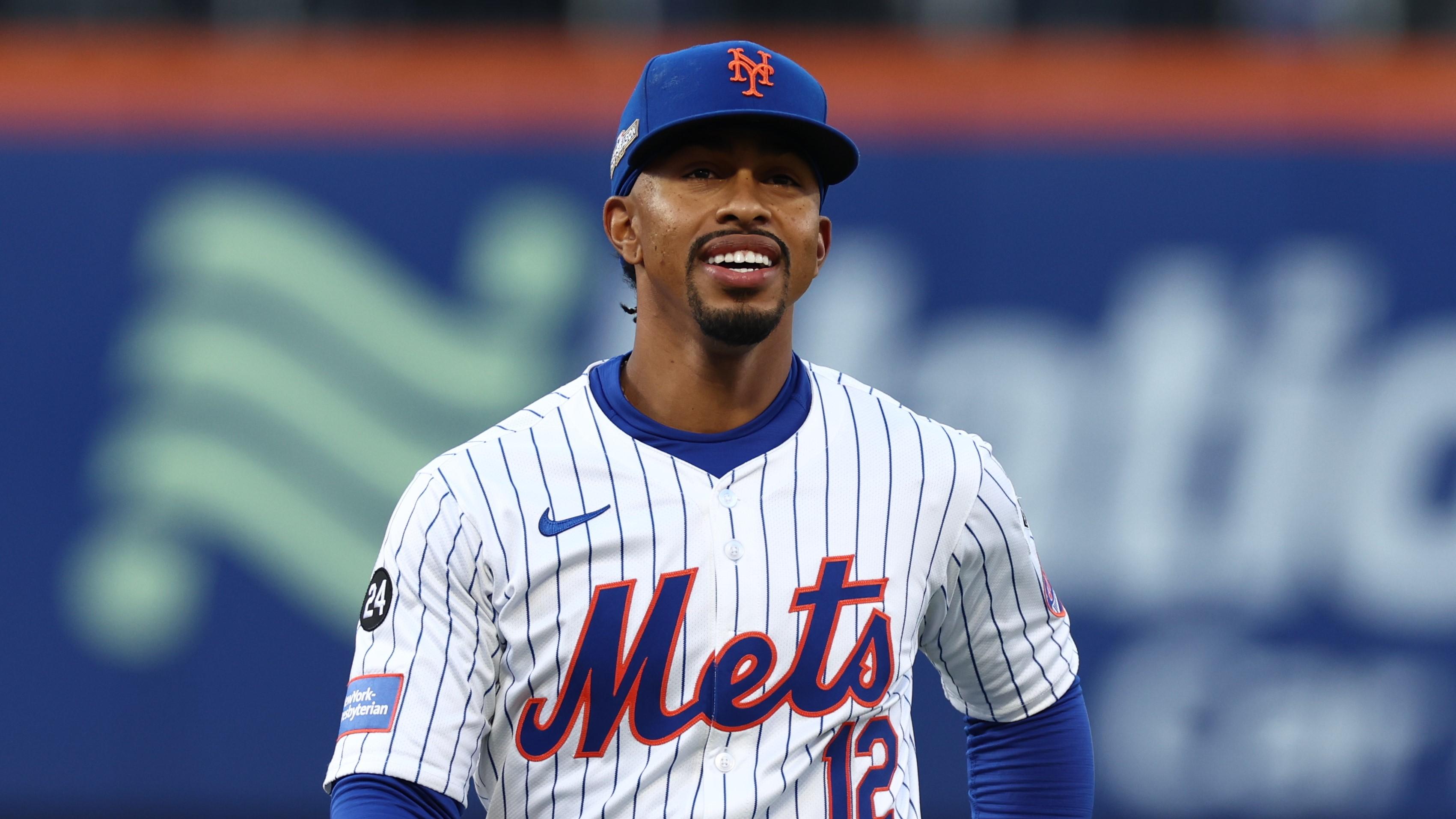 Oct 18, 2024; New York City, New York, USA; New York Mets shortstop Francisco Lindor (12) warms up before a game against the Los Angeles Dodgers during game five of the NLCS for the 2024 MLB playoffs at Citi Field. 